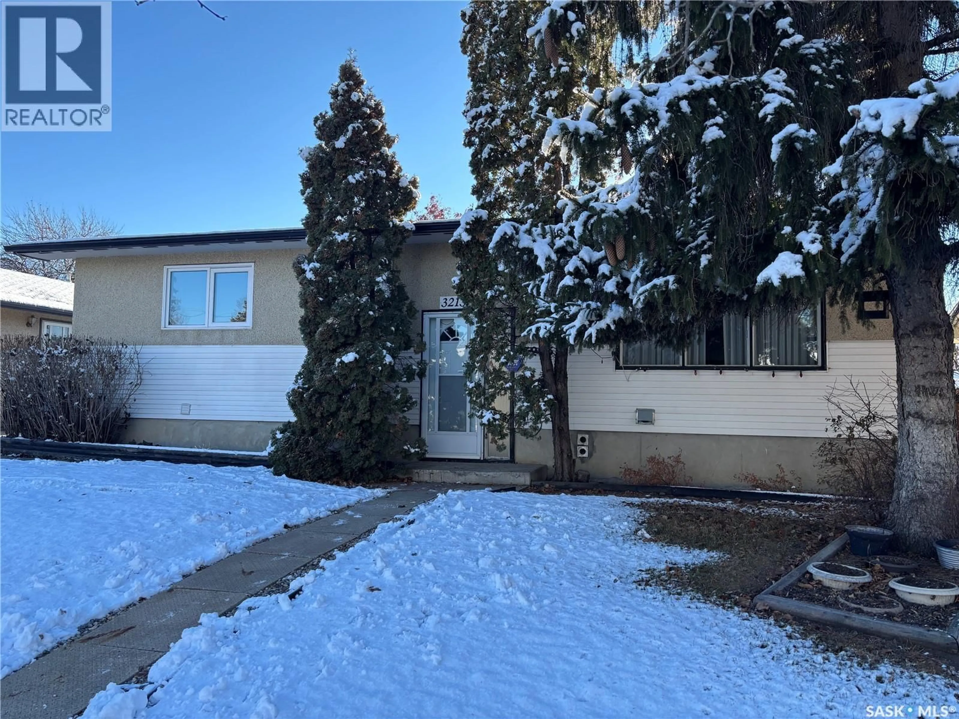 A pic from outside/outdoor area/front of a property/back of a property/a pic from drone, street for 3213 33RD STREET, Saskatoon Saskatchewan S7L4R1