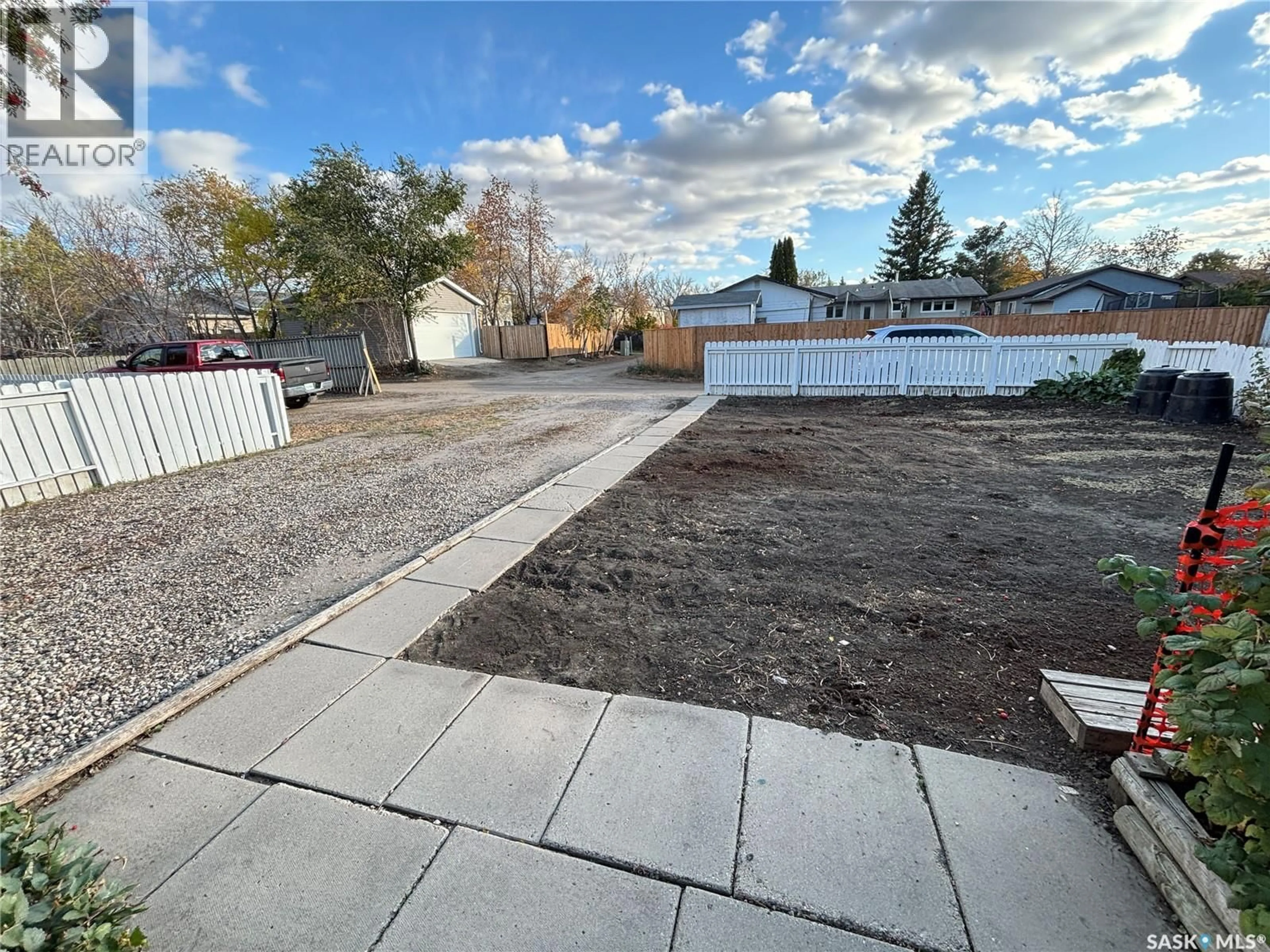 A pic from outside/outdoor area/front of a property/back of a property/a pic from drone, street for 3213 33RD STREET, Saskatoon Saskatchewan S7L4R1