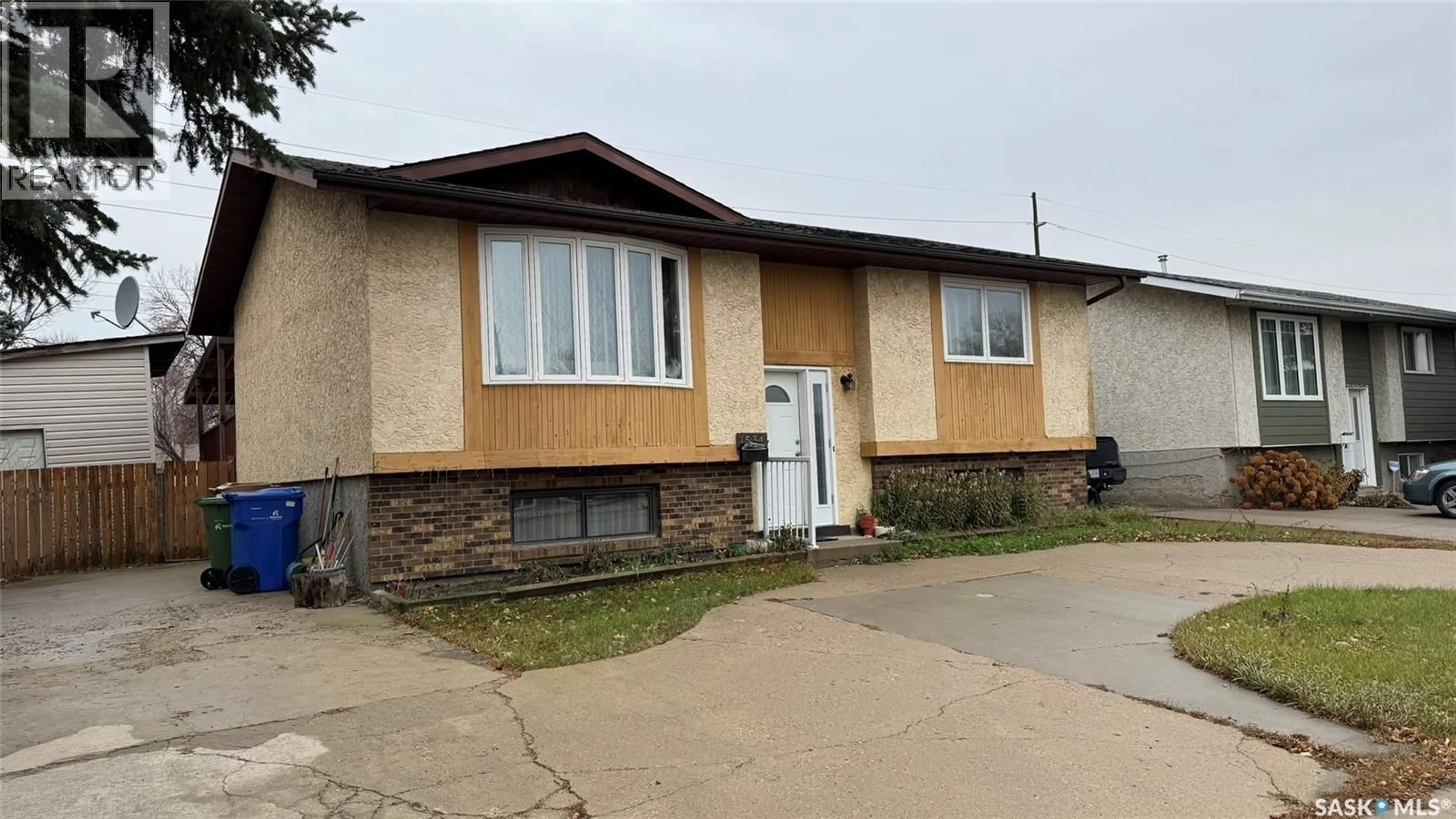 Home with vinyl exterior material, street for 1534 FLEET STREET, Regina Saskatchewan S4N5S1