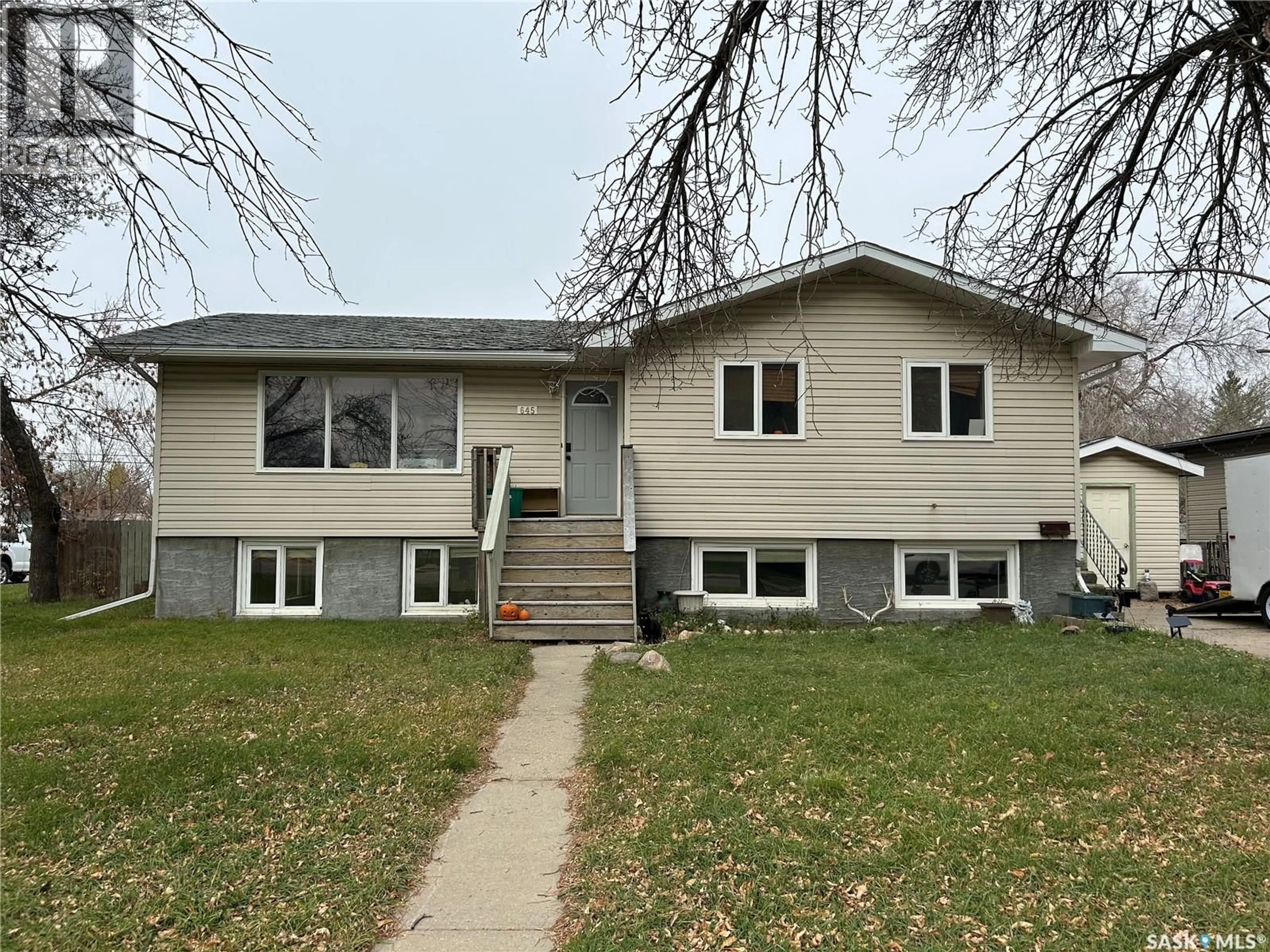 Home with vinyl exterior material, street for 645 ISABELLE STREET, Estevan Saskatchewan S4A1P6