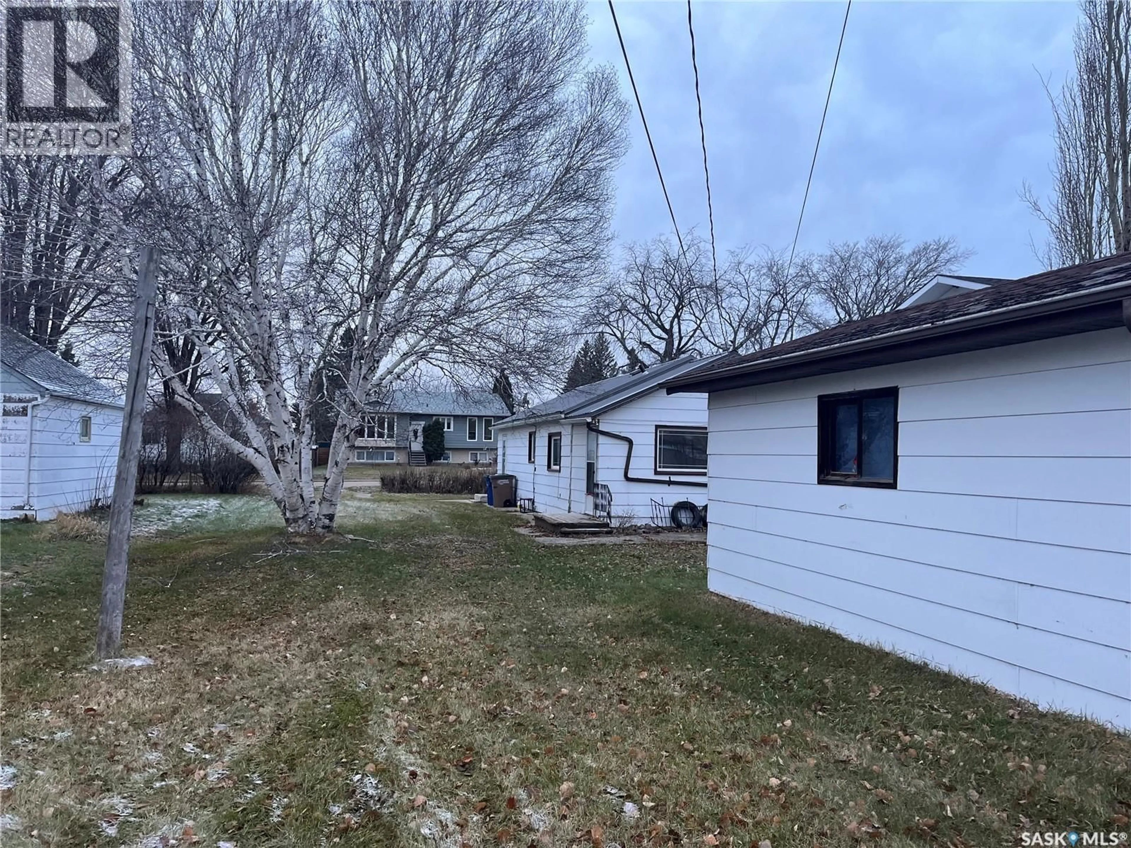 A pic from outside/outdoor area/front of a property/back of a property/a pic from drone, street for 82 3RD STREET, Wadena Saskatchewan S0A4J0