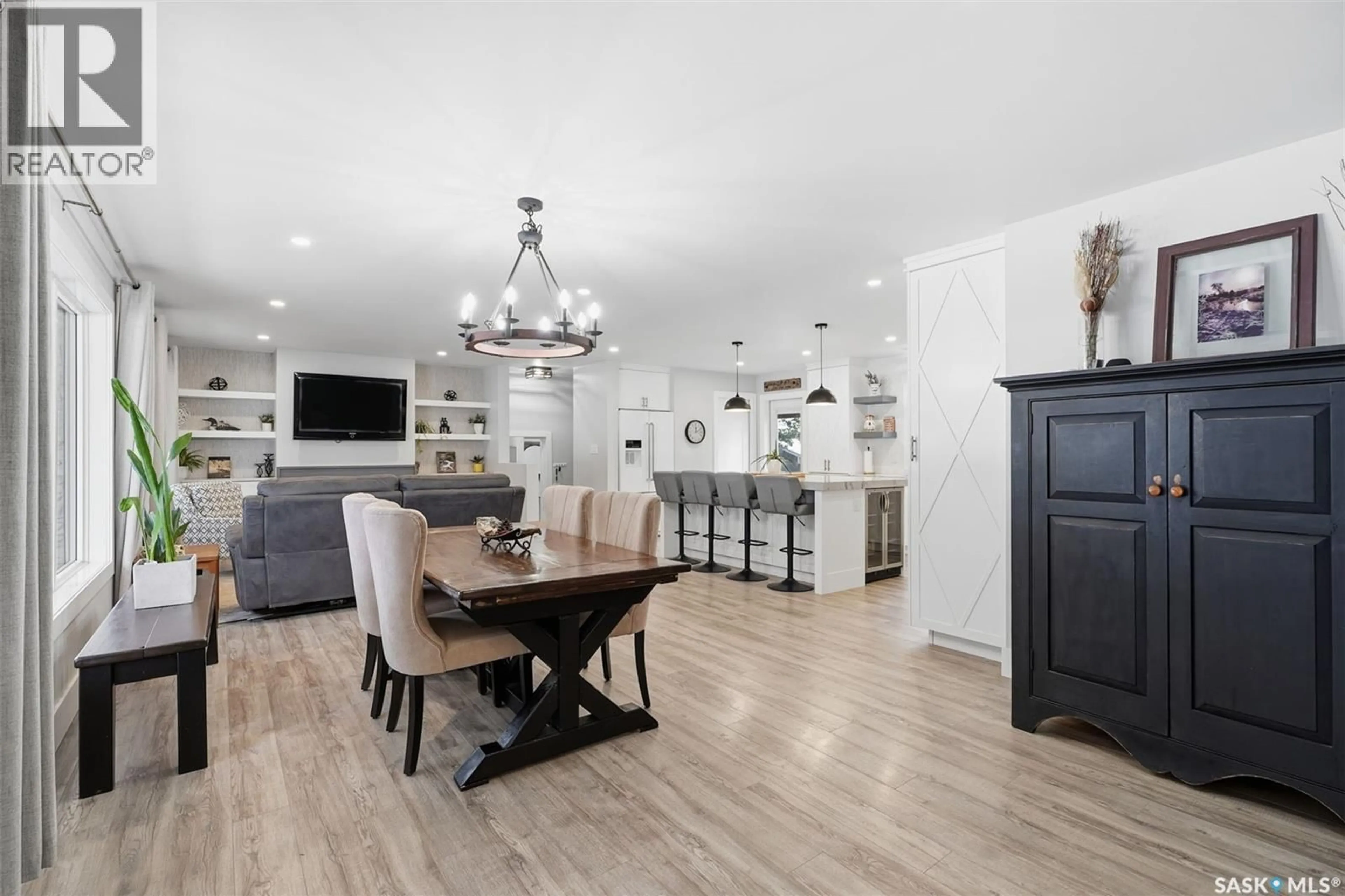 Open concept kitchen, wood/laminate floor for 3117 ORTONA STREET, Saskatoon Saskatchewan S7M3R3