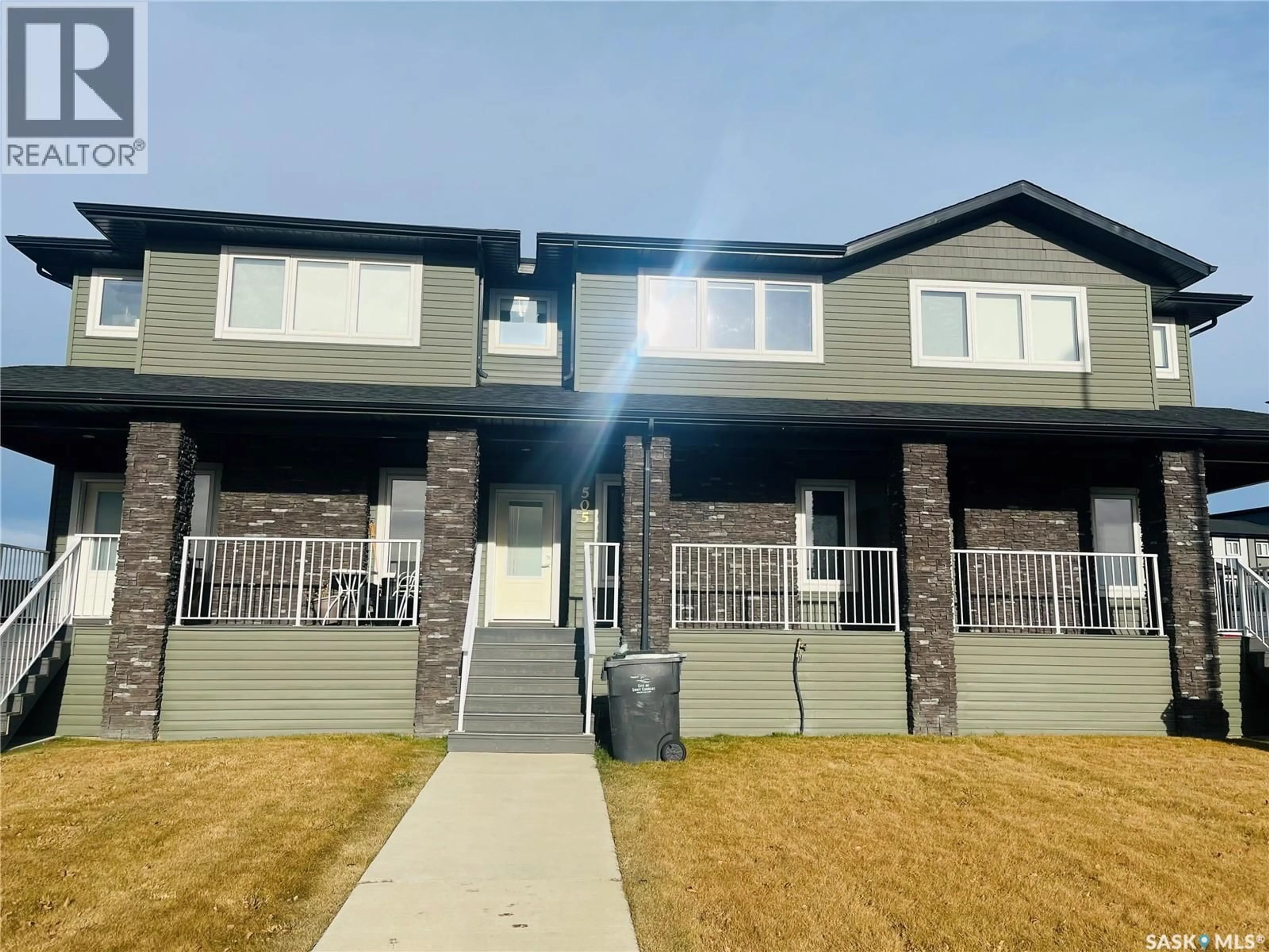Home with vinyl exterior material, street for 505 DOUGLAS DRIVE, Swift Current Saskatchewan S9H5R6