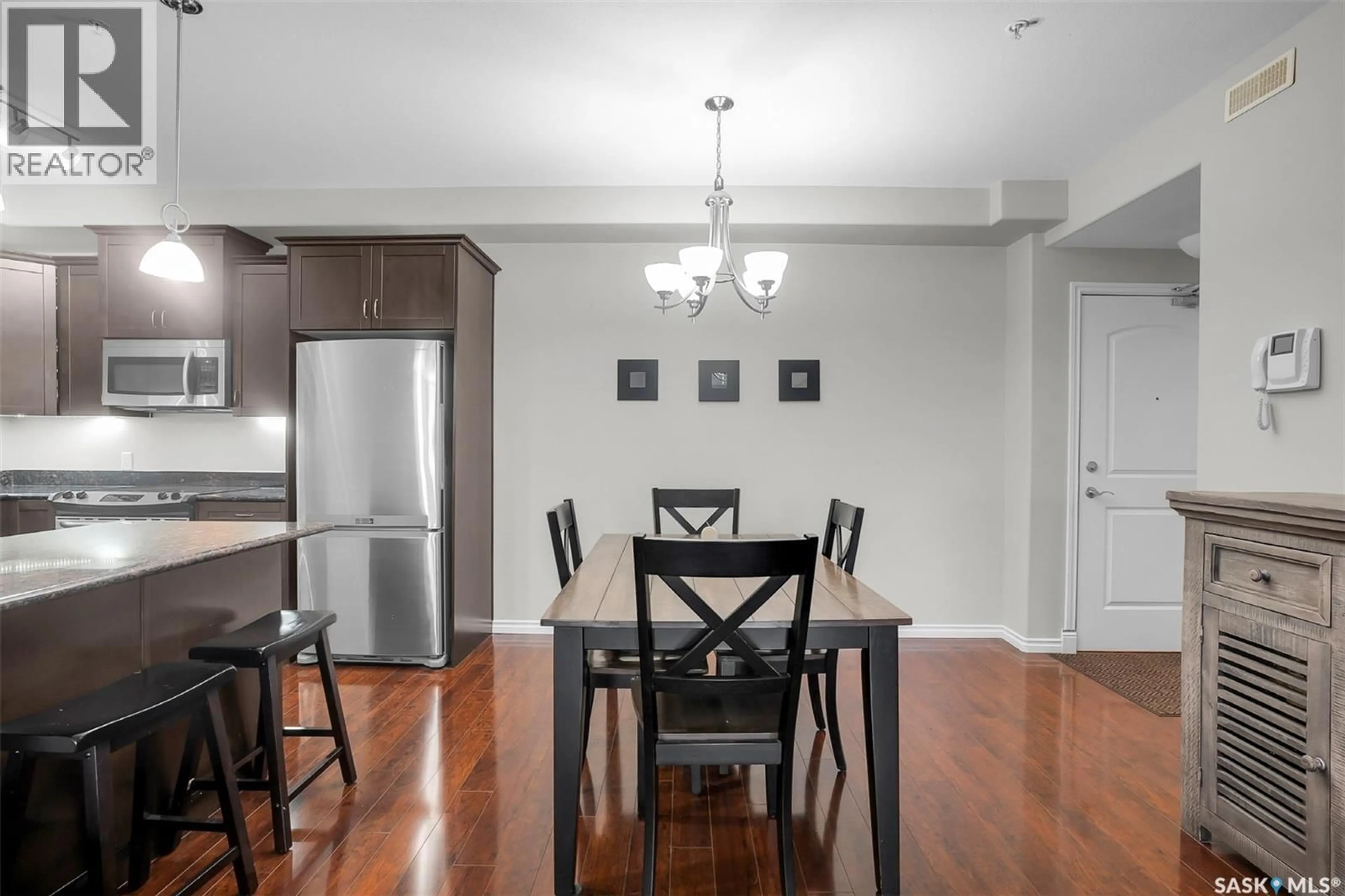 Dining room, wood/laminate floor for 125 - 2710 MAIN STREET, Saskatoon Saskatchewan S7M0M3
