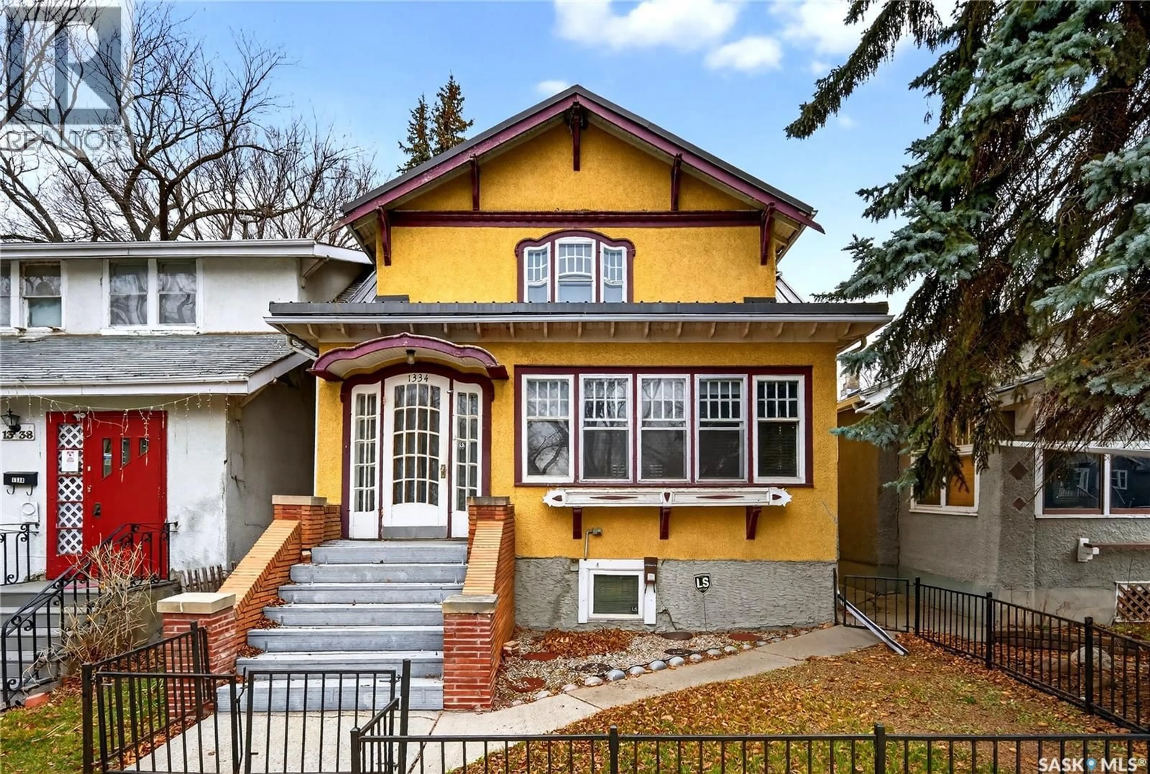 Home with brick exterior material, street for 1334 VICTORIA AVENUE, Regina Saskatchewan S4P0P1