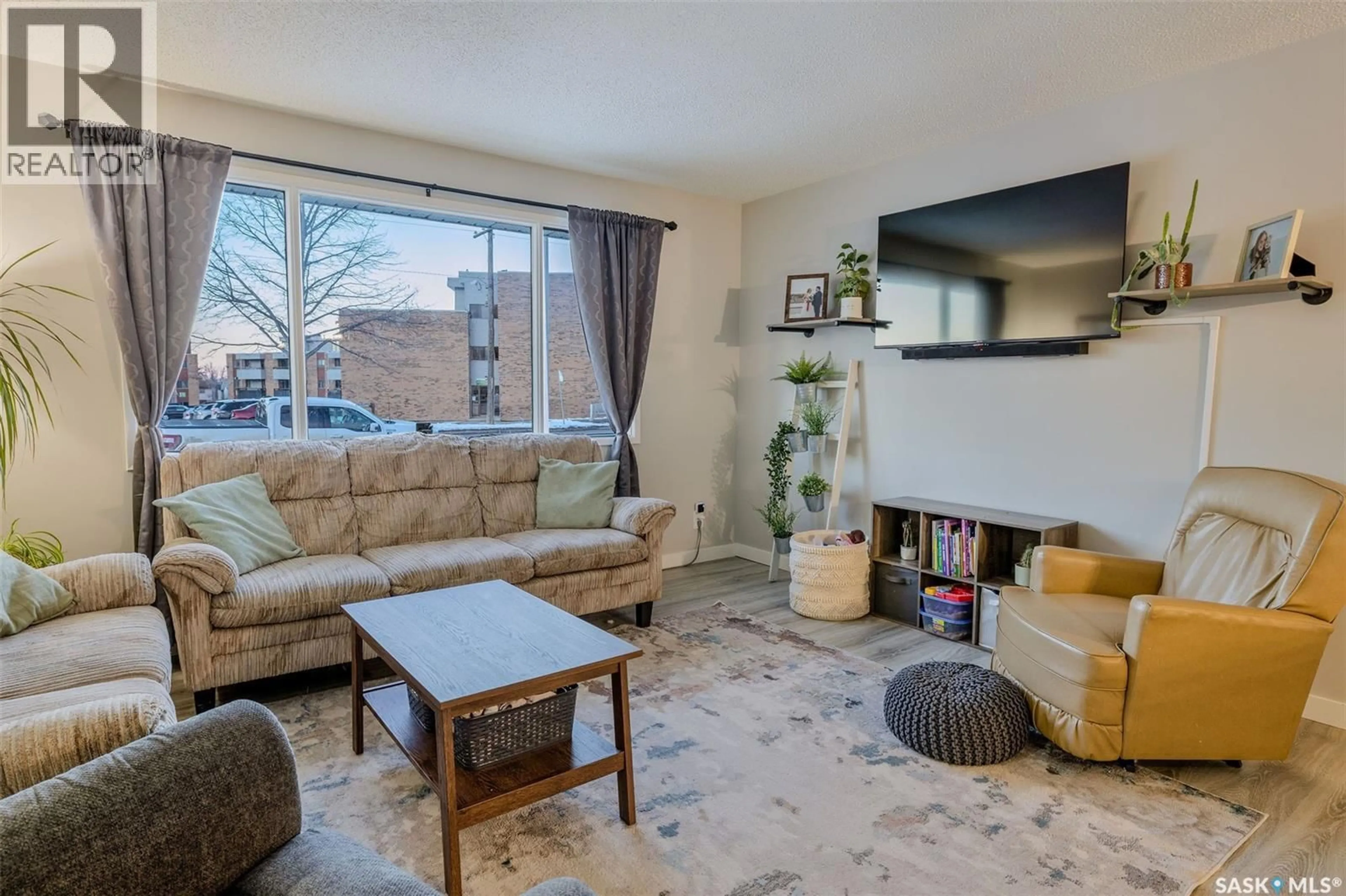 Living room with furniture, unknown for 3111 33RD STREET, Saskatoon Saskatchewan S7L0X8