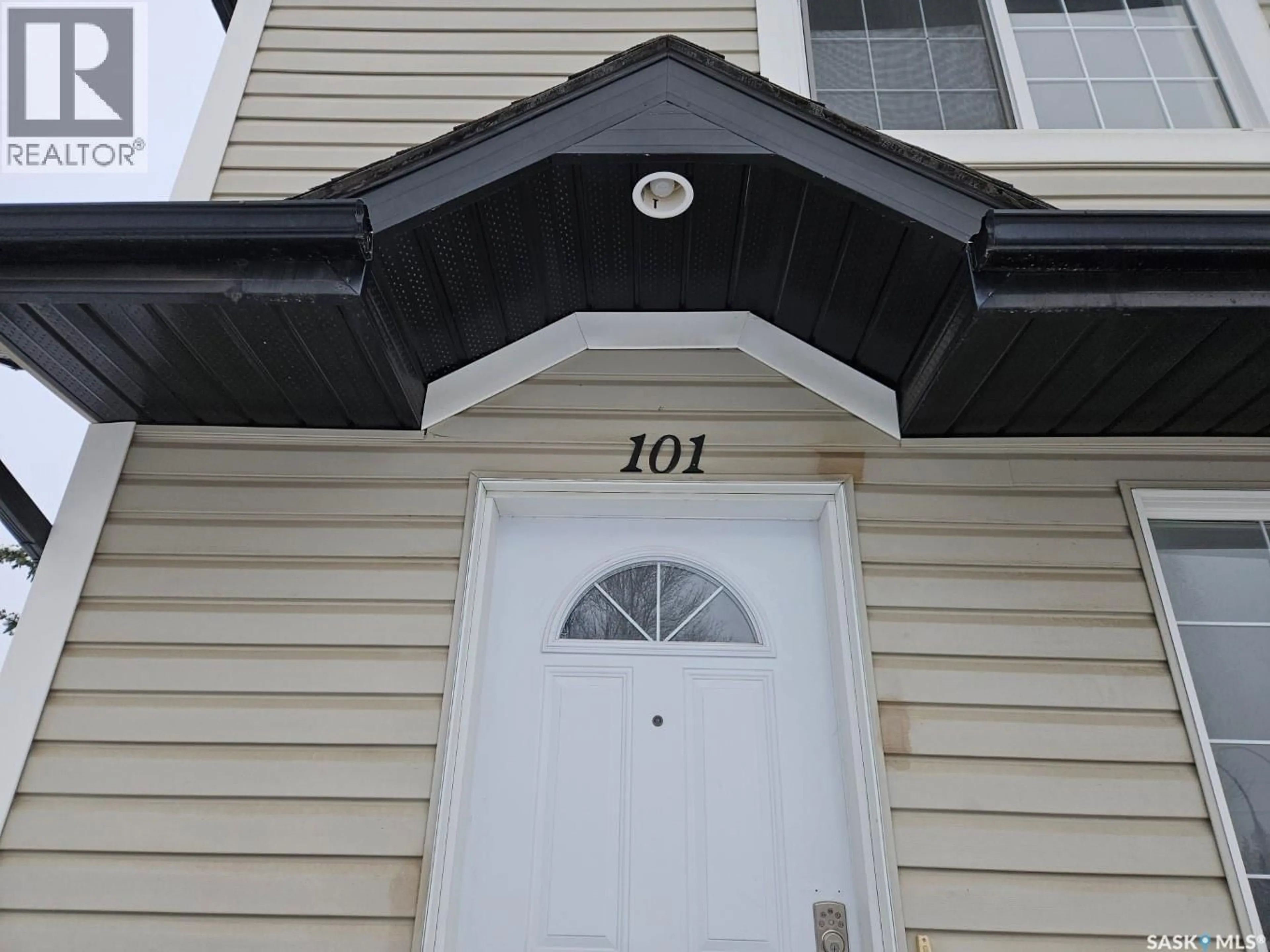 Home with vinyl exterior material, street for 101 103 RUTHERFORD CRESCENT, Saskatoon Saskatchewan S7N4X9