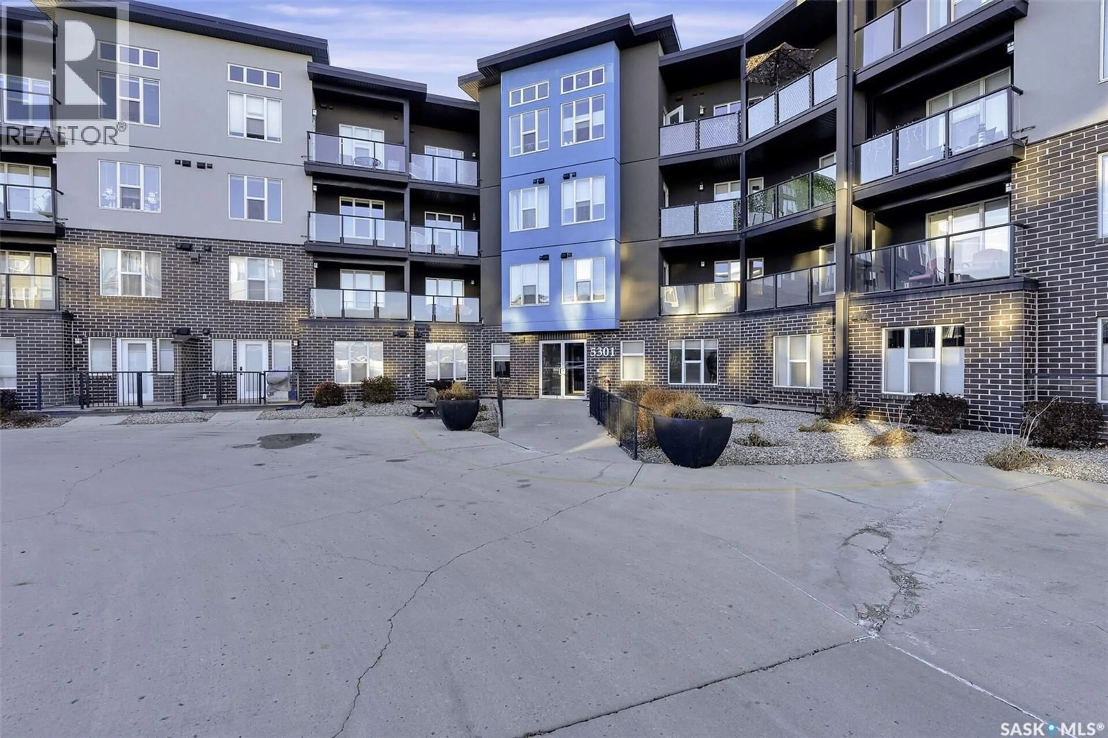 A pic from outside/outdoor area/front of a property/back of a property/a pic from drone, unknown for 302 - 5301 UNIVERSAL CRESCENT, Regina Saskatchewan S4W0L2