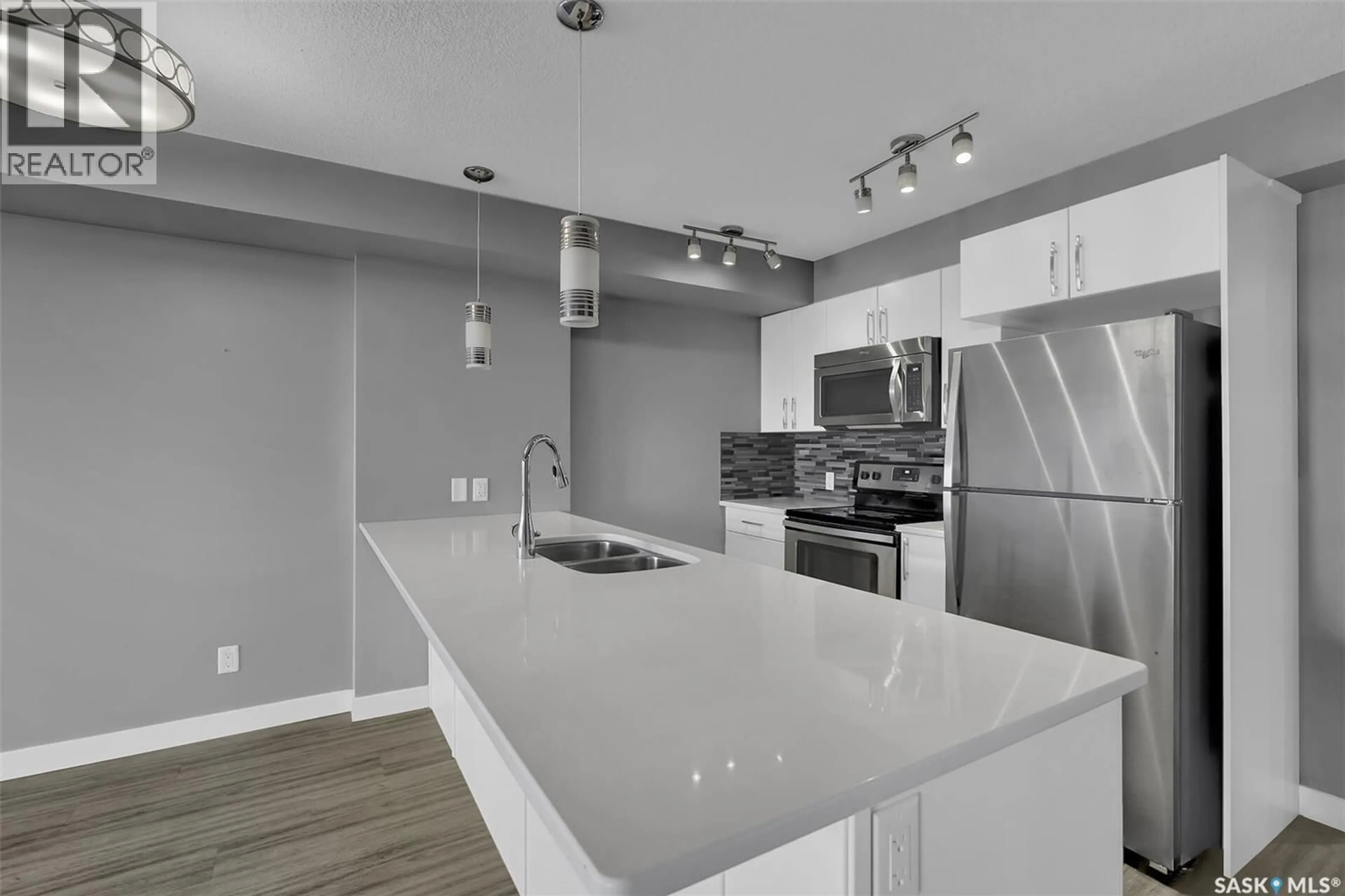 Open concept kitchen, unknown for 302 - 5301 UNIVERSAL CRESCENT, Regina Saskatchewan S4W0L2