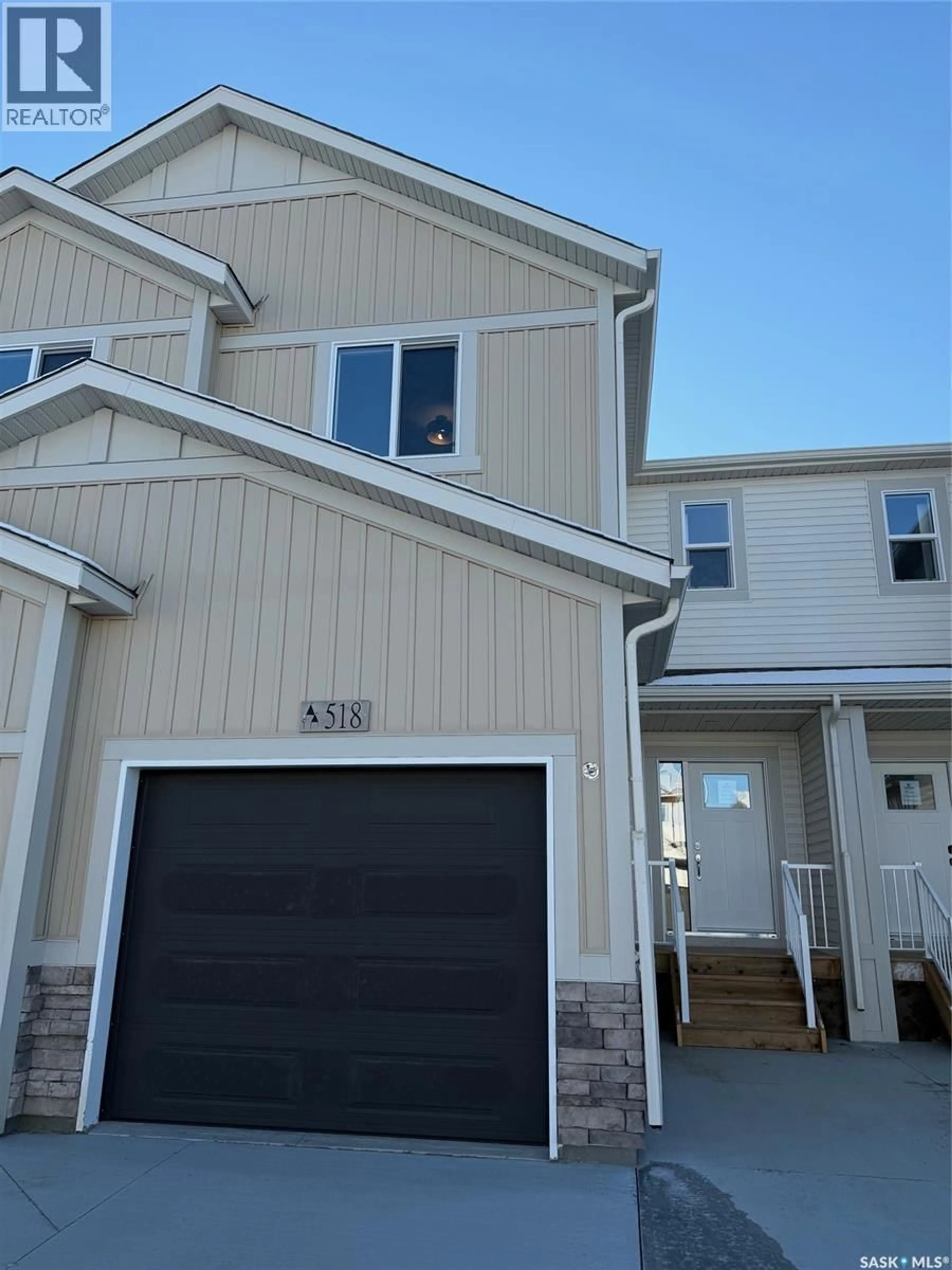 Home with vinyl exterior material, street for 518 MYLES HEIDT MANOR, Saskatoon Saskatchewan S7W0Z4