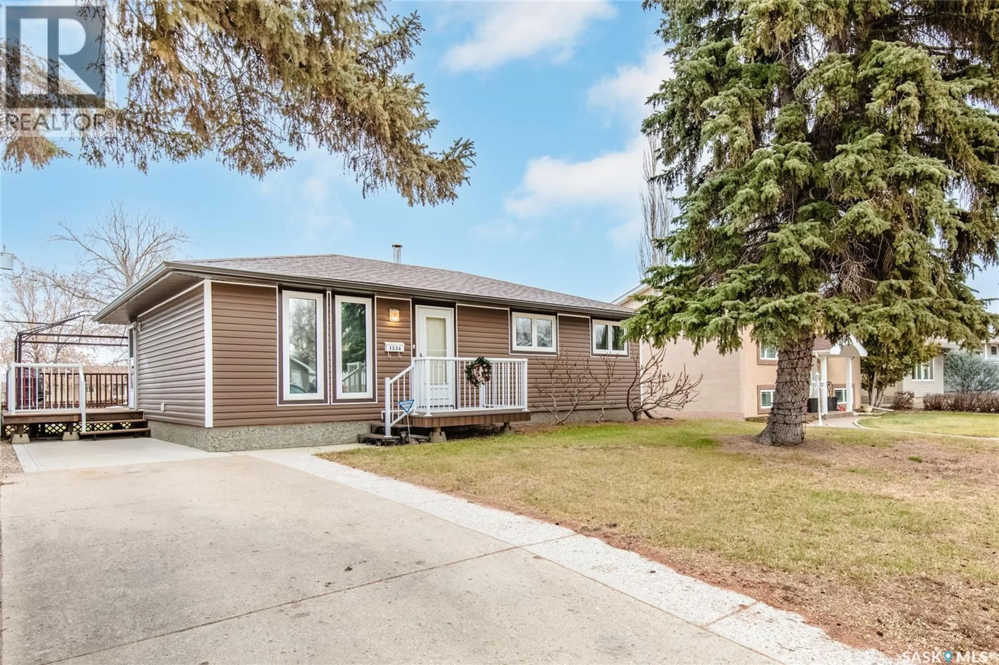 Home with vinyl exterior material, street for 1534 VAUGHAN STREET, Moose Jaw Saskatchewan S6H6S7