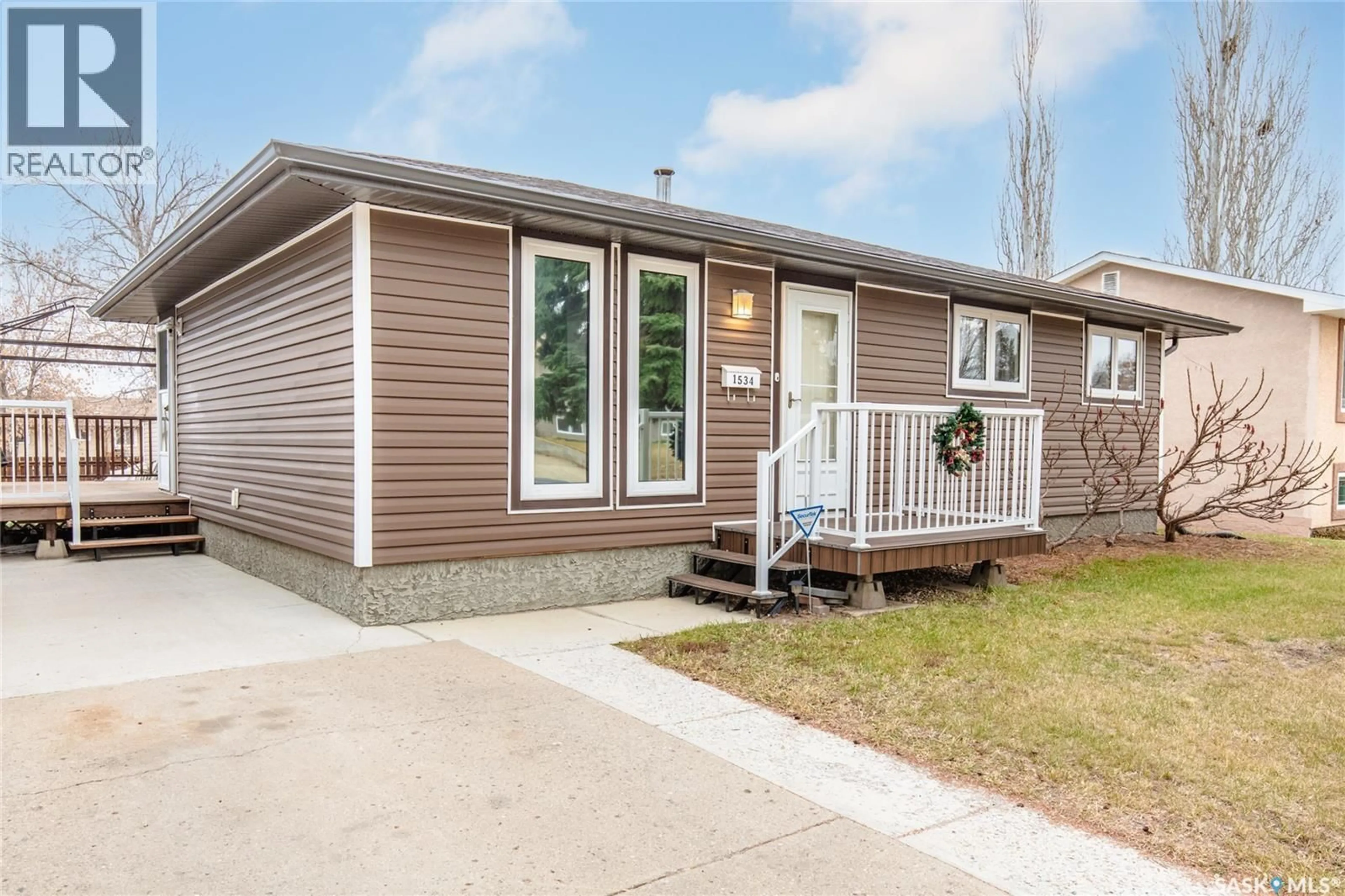 Home with vinyl exterior material, street for 1534 VAUGHAN STREET, Moose Jaw Saskatchewan S6H6S7