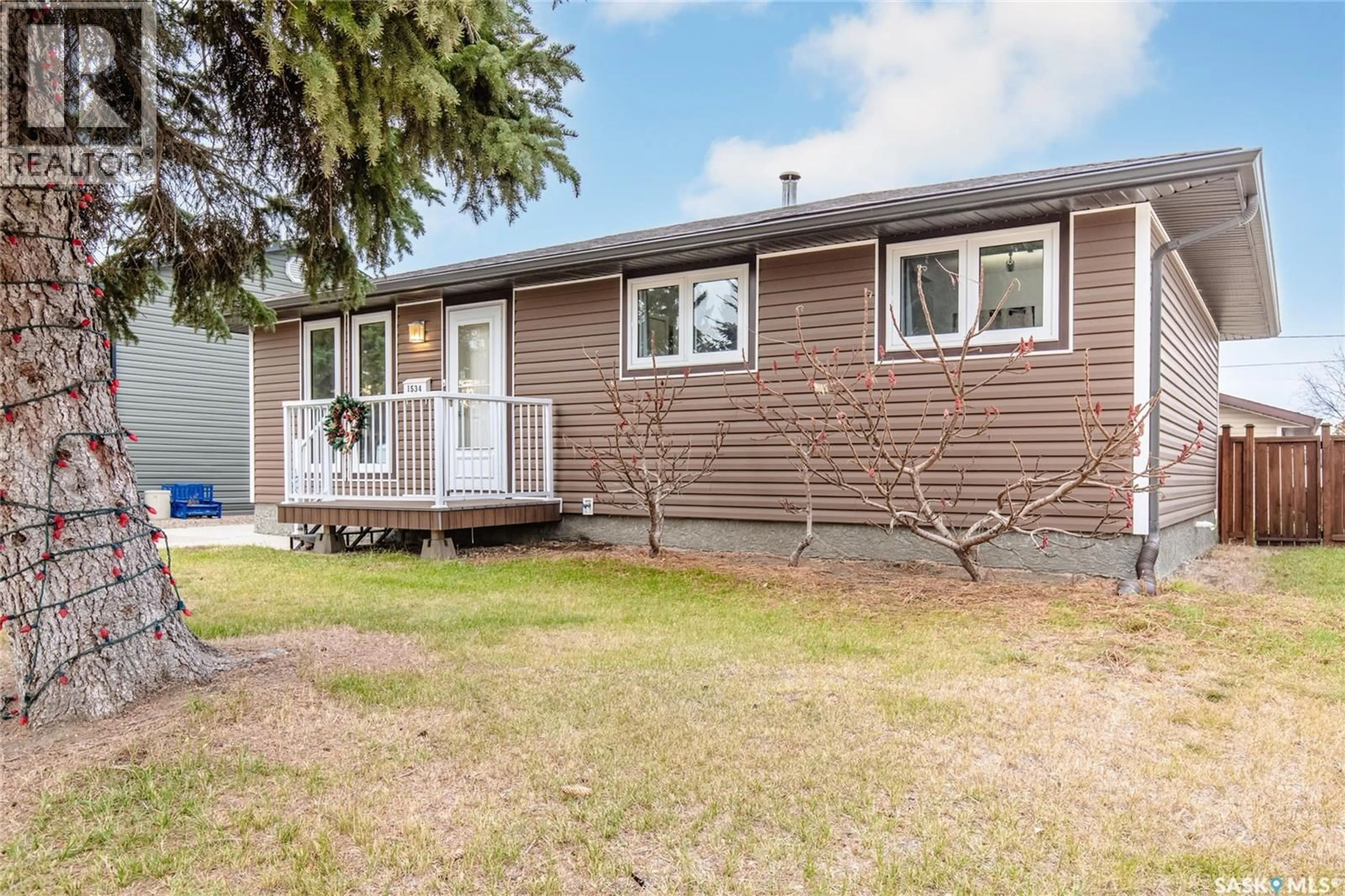 Home with vinyl exterior material, street for 1534 VAUGHAN STREET, Moose Jaw Saskatchewan S6H6S7