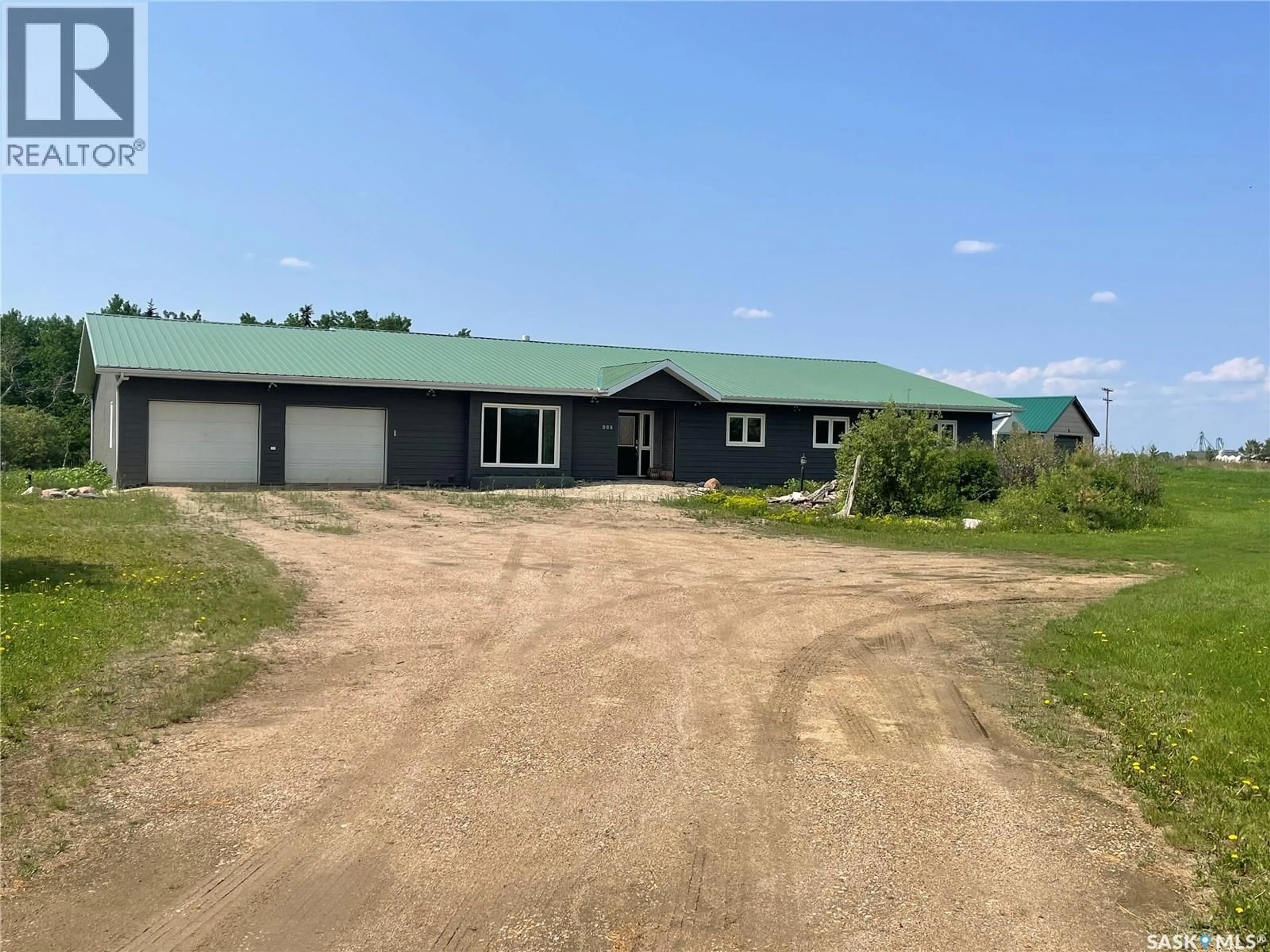 A pic from outside/outdoor area/front of a property/back of a property/a pic from drone, building for 999 MELFORT STREET, Melfort Saskatchewan S0E1A0