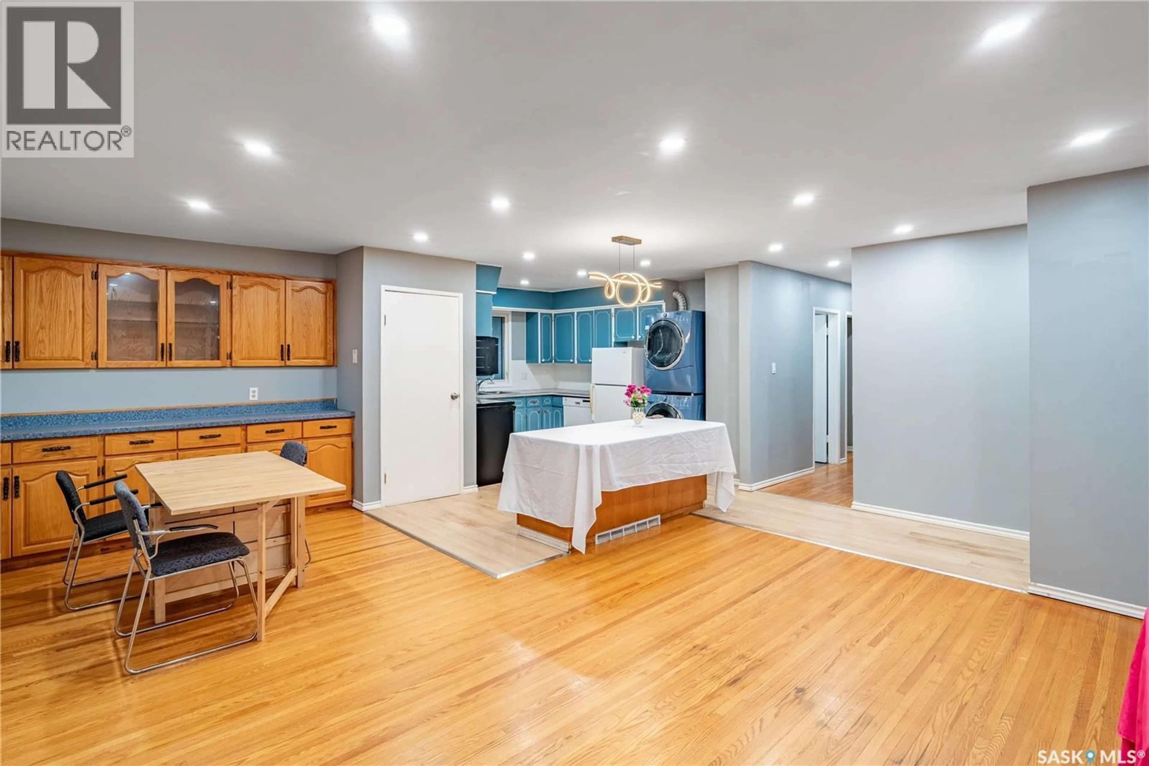 Open concept kitchen, wood/laminate floor for 3205 GRANT ROAD, Regina Saskatchewan S4S5H3