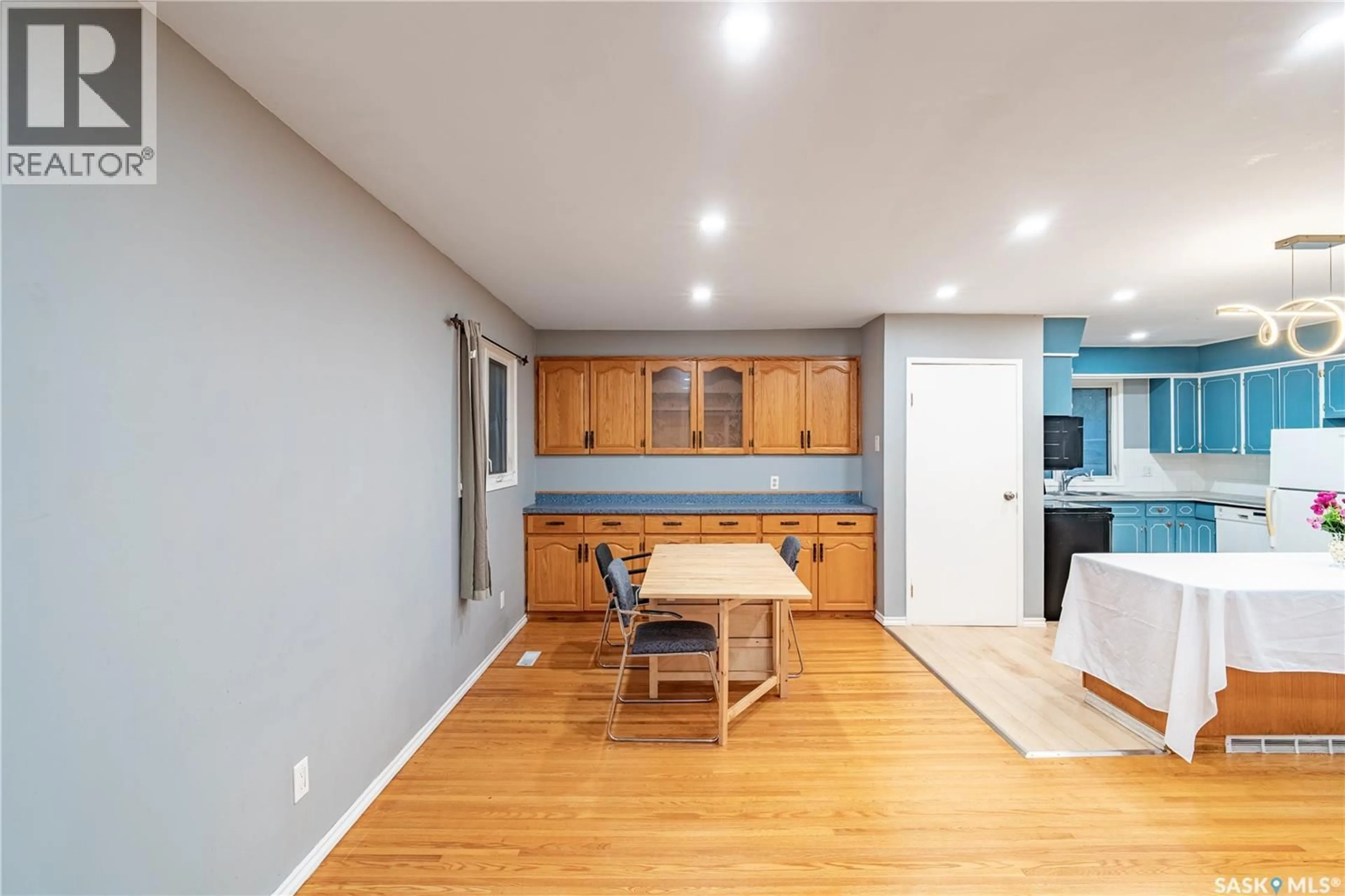 Open concept kitchen, wood/laminate floor for 3205 GRANT ROAD, Regina Saskatchewan S4S5H3