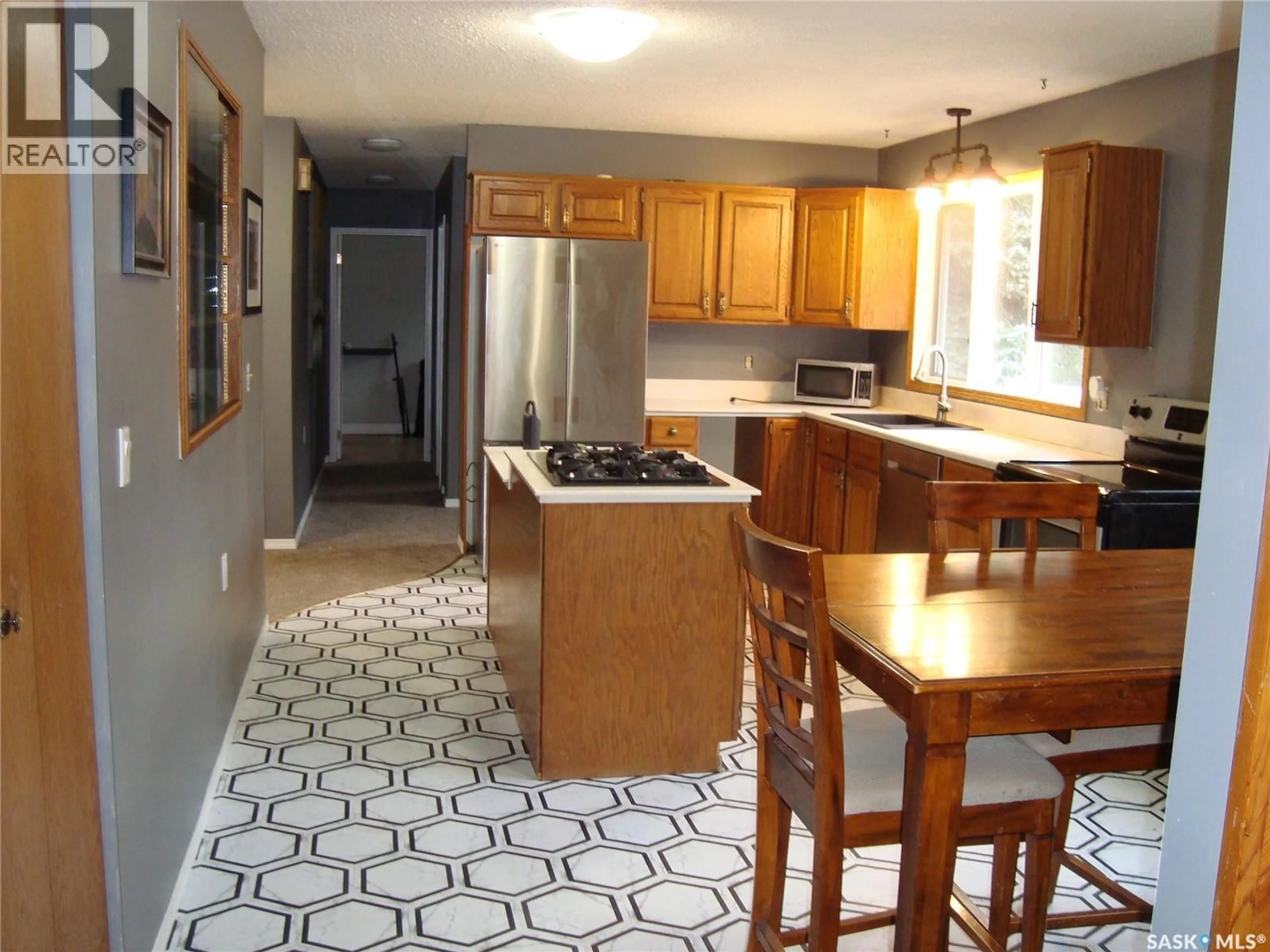Open concept kitchen, ceramic/tile floor for 105 4TH AVENUE, Kyle Saskatchewan S0L1T0