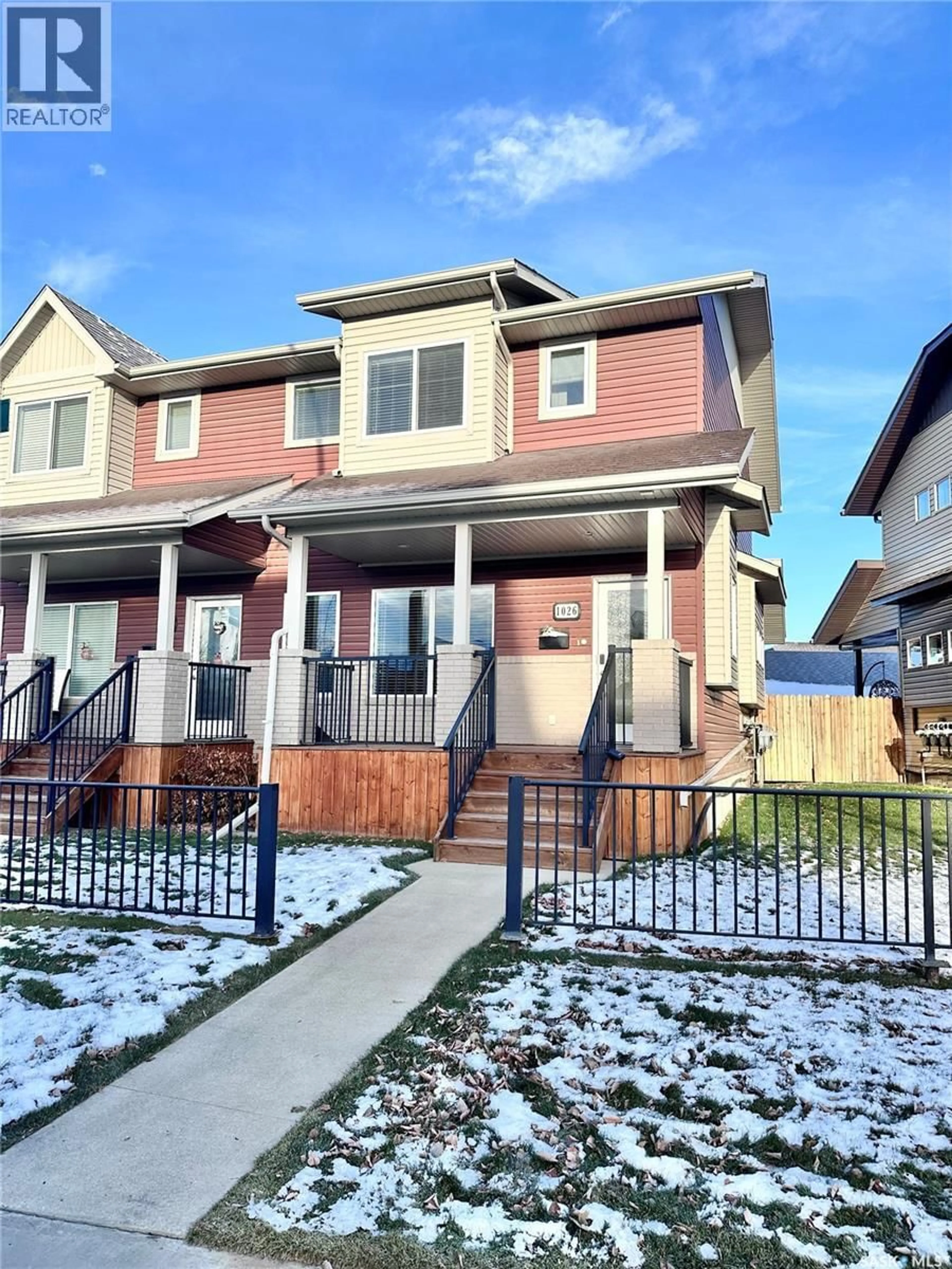 Home with vinyl exterior material, street for 1026 WILLOWGROVE CRESCENT, Saskatoon Saskatchewan S7W0H7