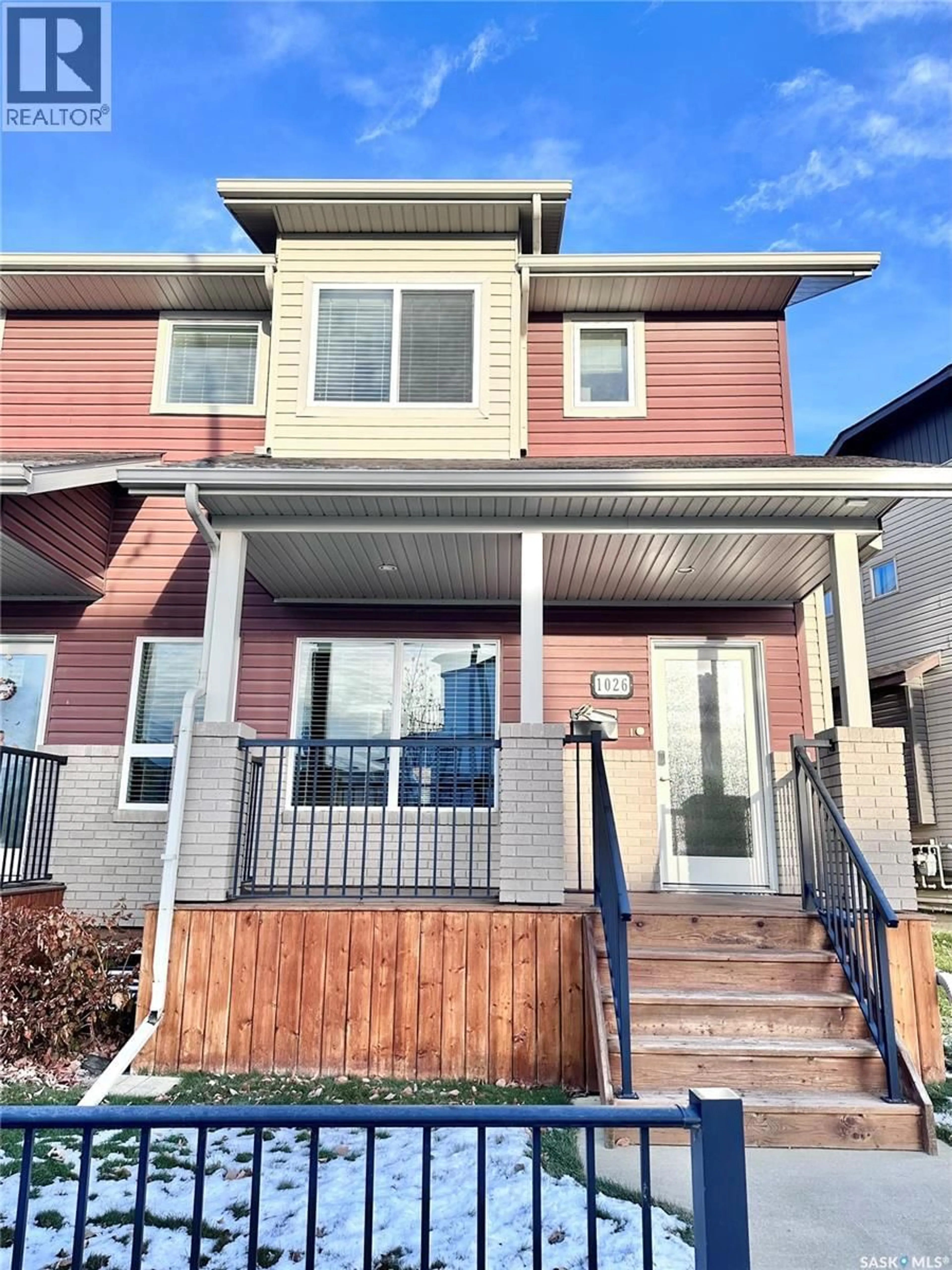 Home with vinyl exterior material, street for 1026 WILLOWGROVE CRESCENT, Saskatoon Saskatchewan S7W0H7