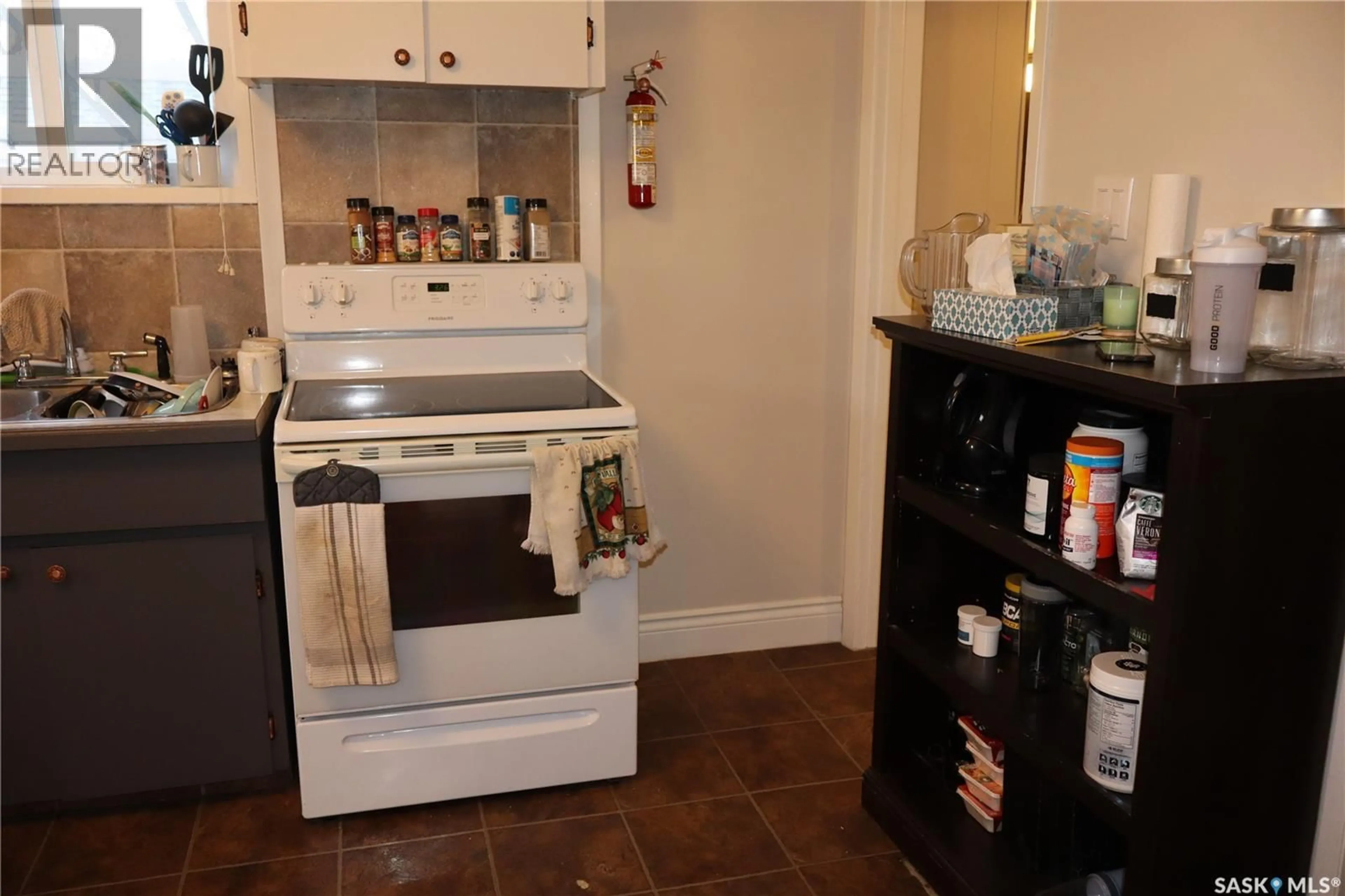 Standard kitchen, ceramic/tile floor for 203 5TH AVENUE, Assiniboia Saskatchewan S0H0B0