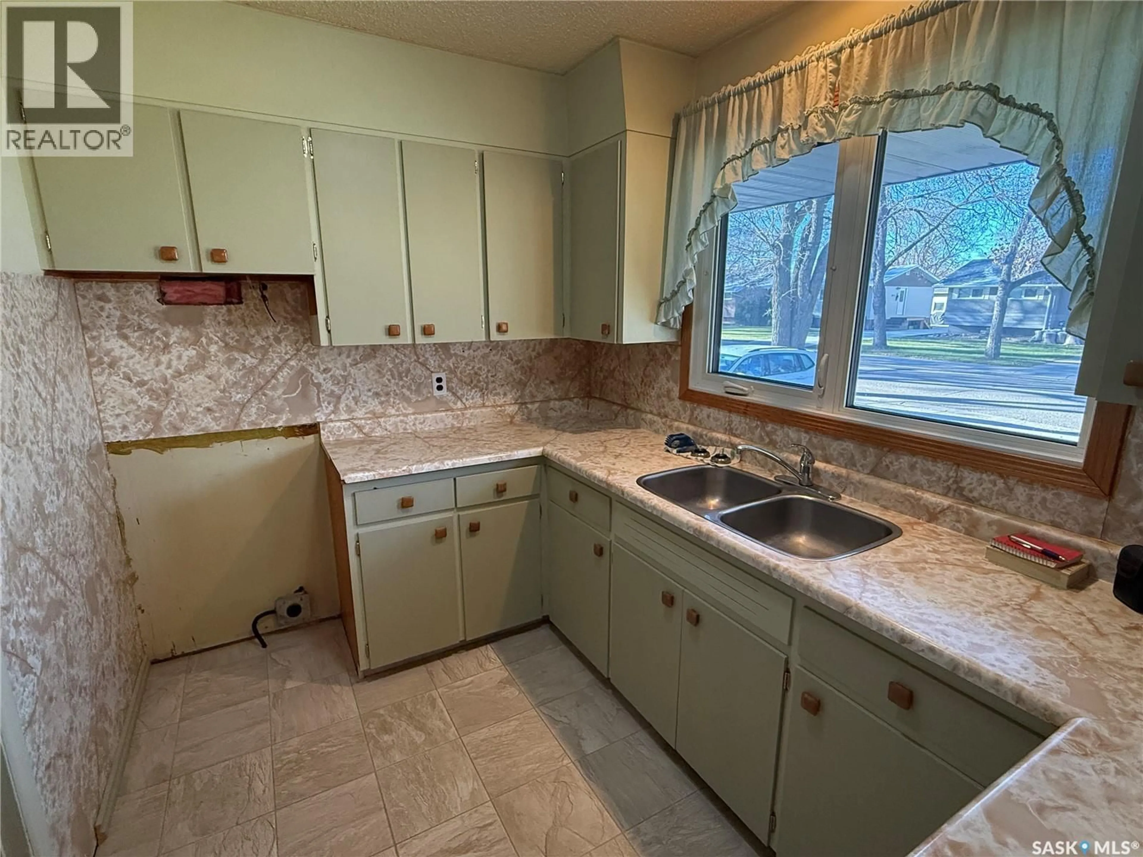 Standard kitchen, ceramic/tile floor for 127 ASH DRIVE, Weyburn Saskatchewan S4H0S3