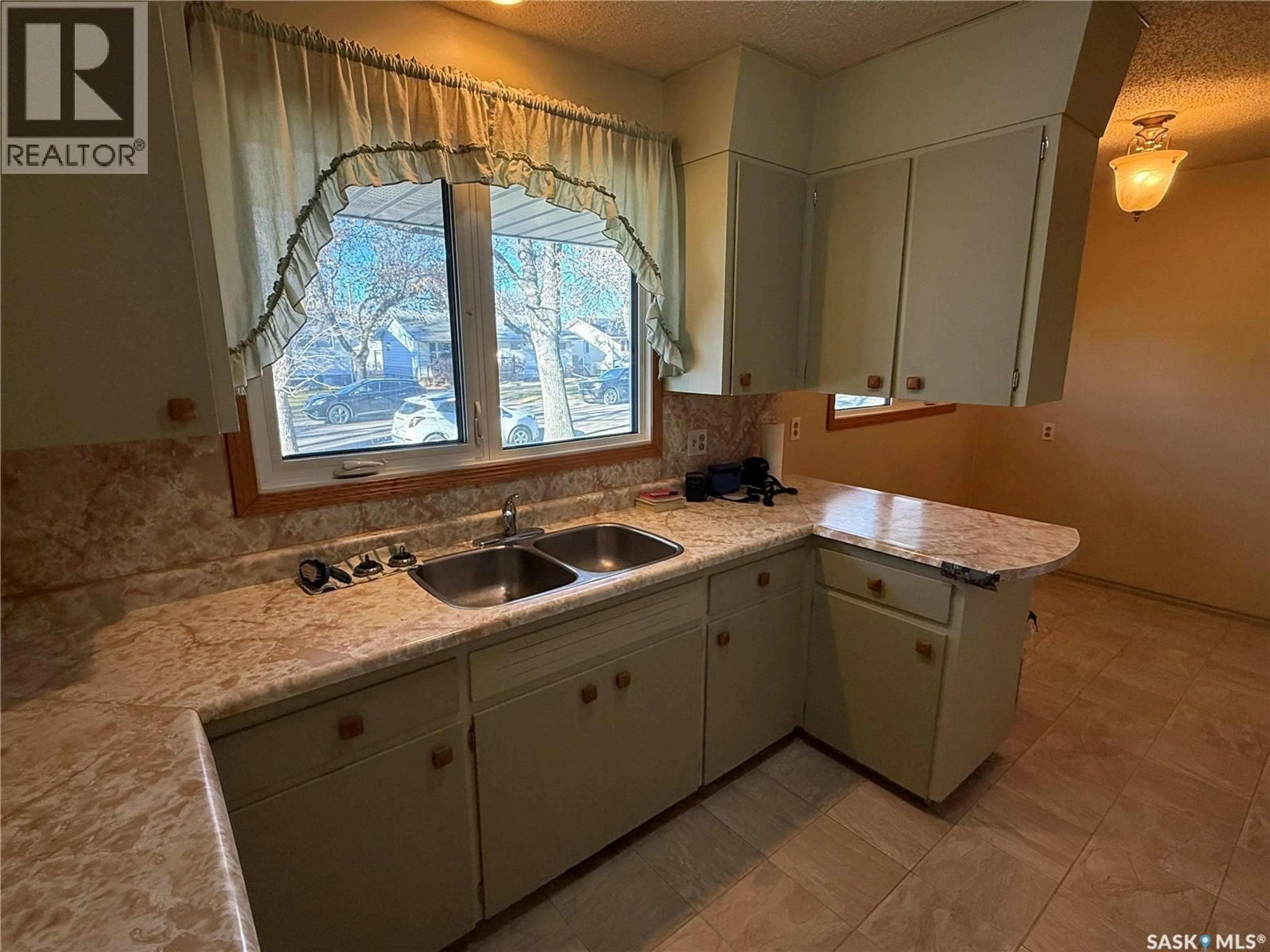 Standard kitchen, ceramic/tile floor for 127 ASH DRIVE, Weyburn Saskatchewan S4H0S3