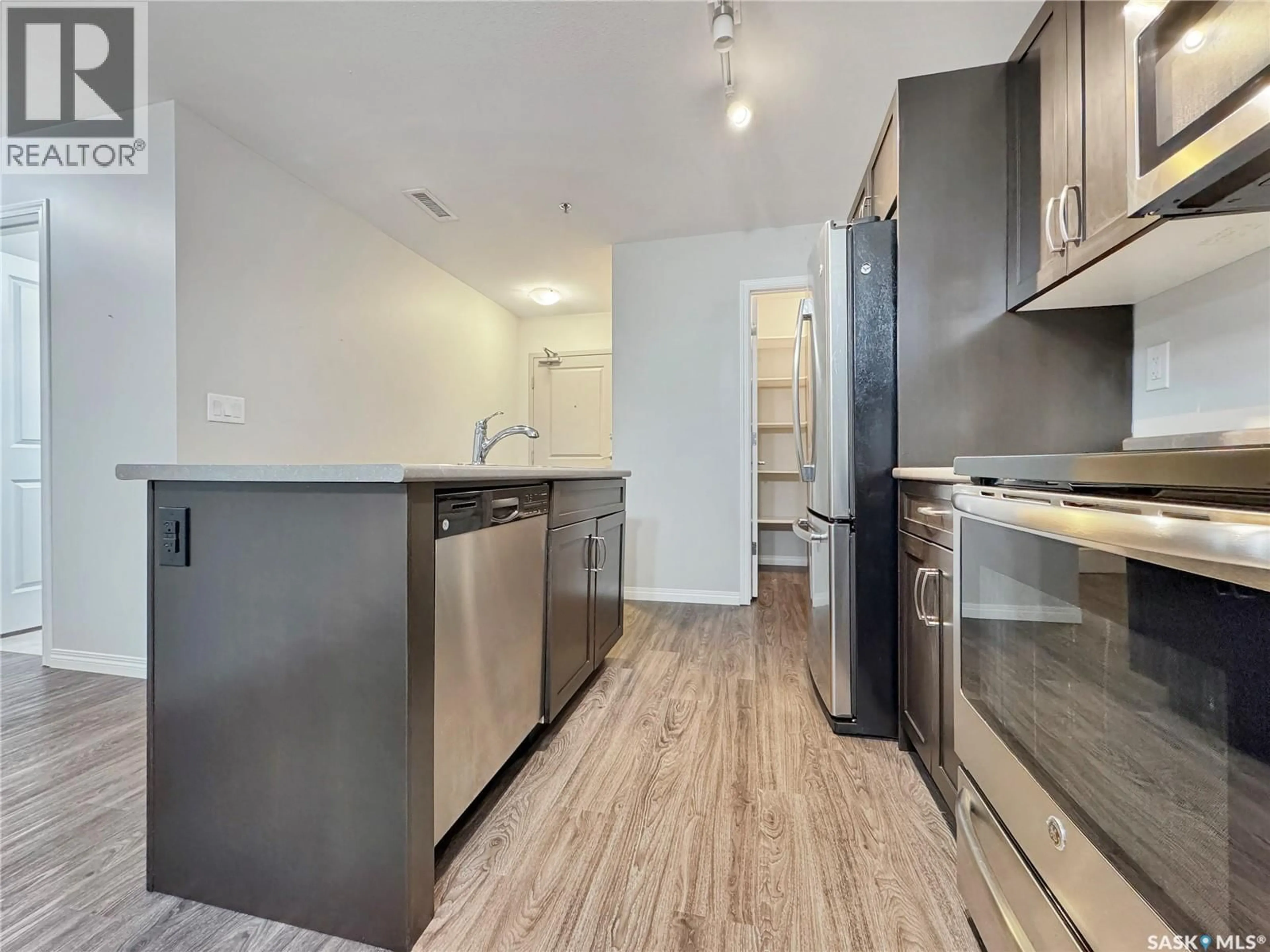 Standard kitchen, wood/laminate floor for 205 - 2452 KILLDEER DRIVE, North Battleford Saskatchewan S9A3T5