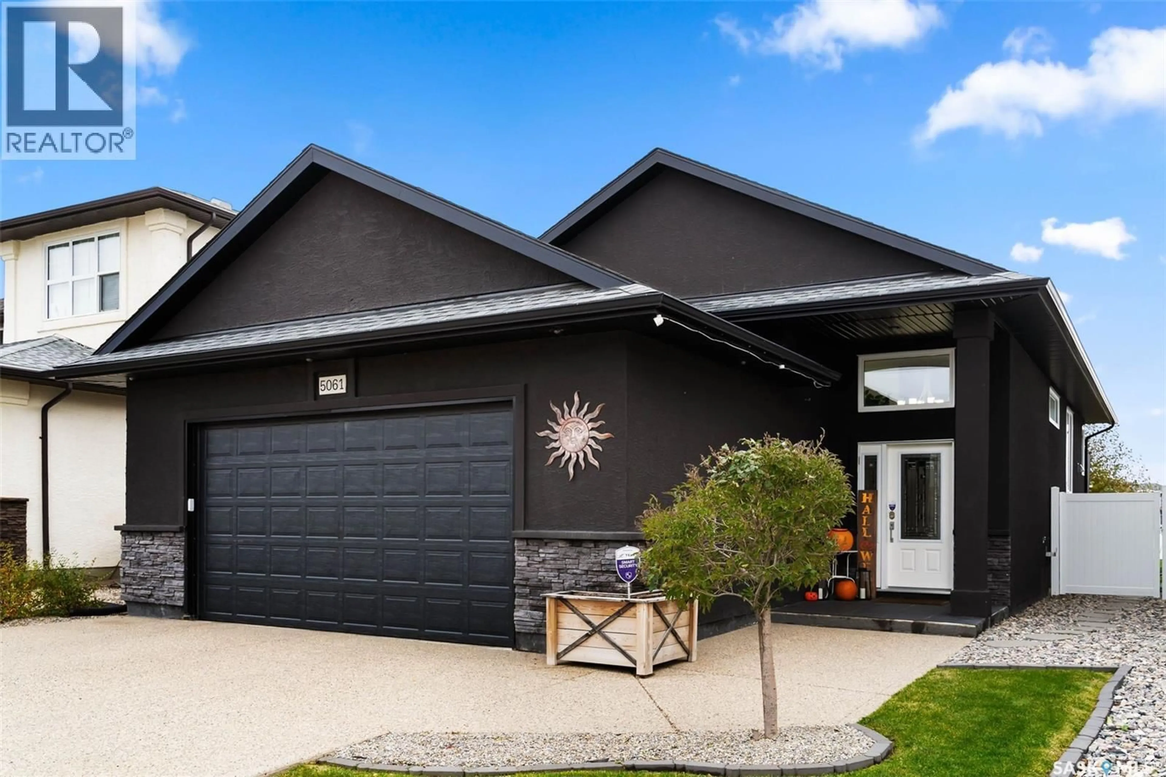 Home with vinyl exterior material, street for 5061 SNOWBIRDS CRESCENT, Regina Saskatchewan S4W0H5