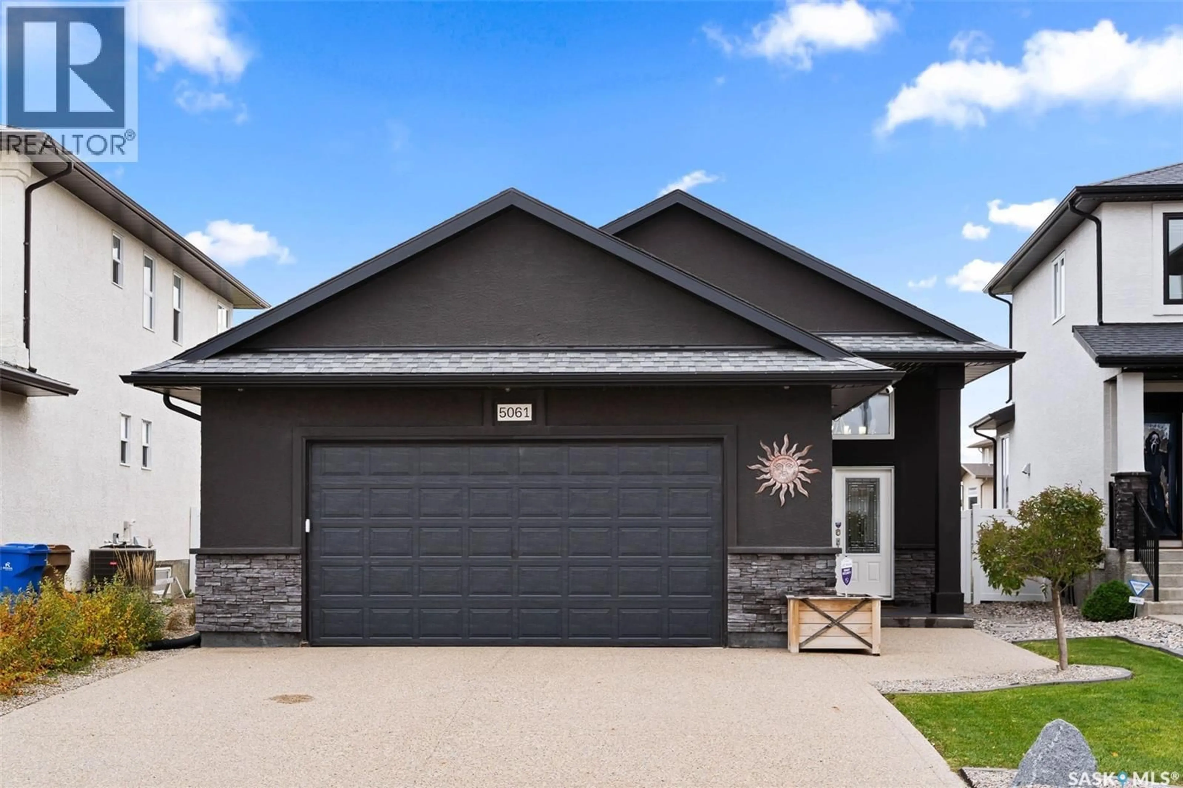 Home with vinyl exterior material, street for 5061 SNOWBIRDS CRESCENT, Regina Saskatchewan S4W0H5