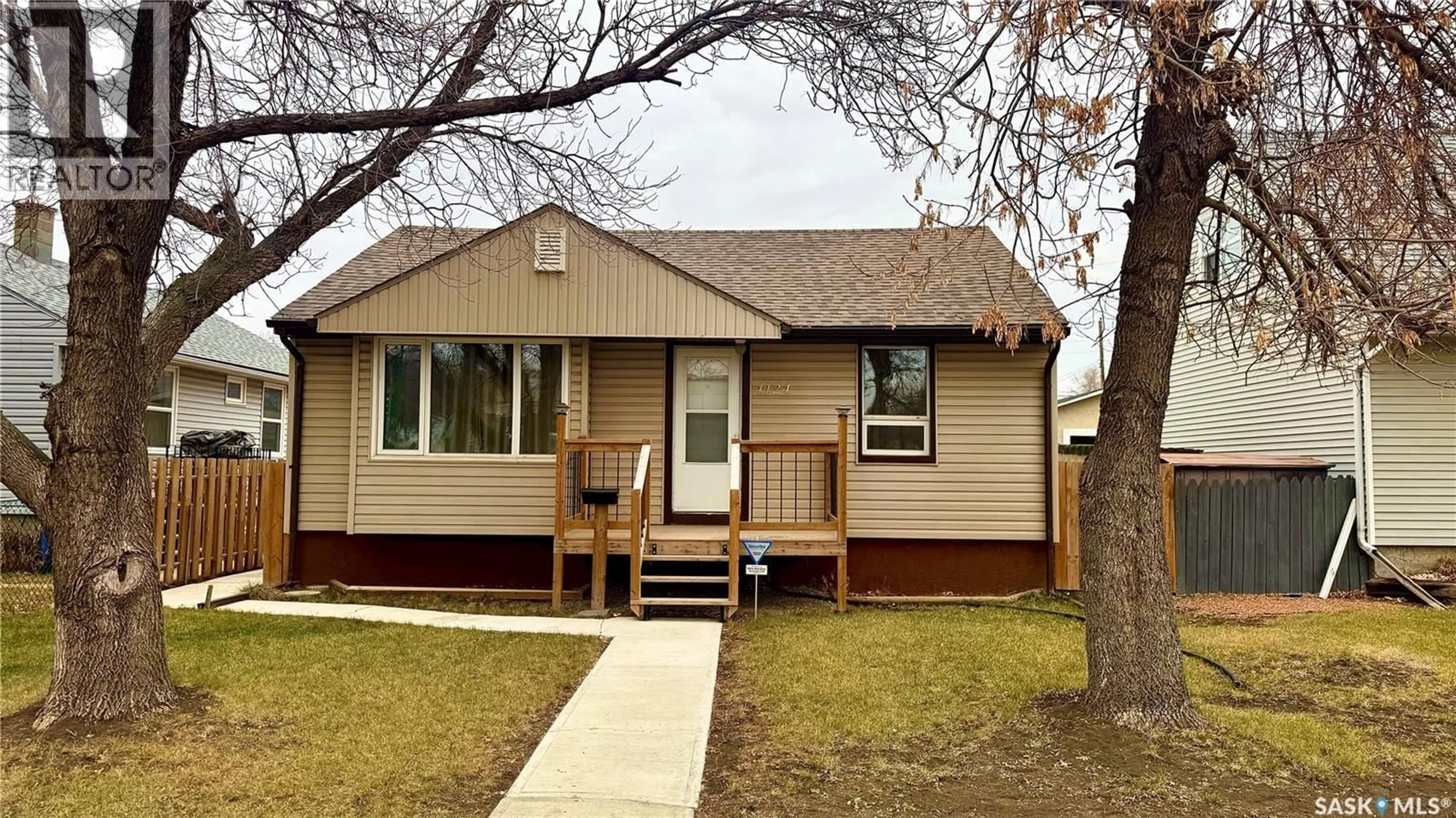 Home with vinyl exterior material, street for 4124 4TH AVENUE, Regina Saskatchewan S4T0H5
