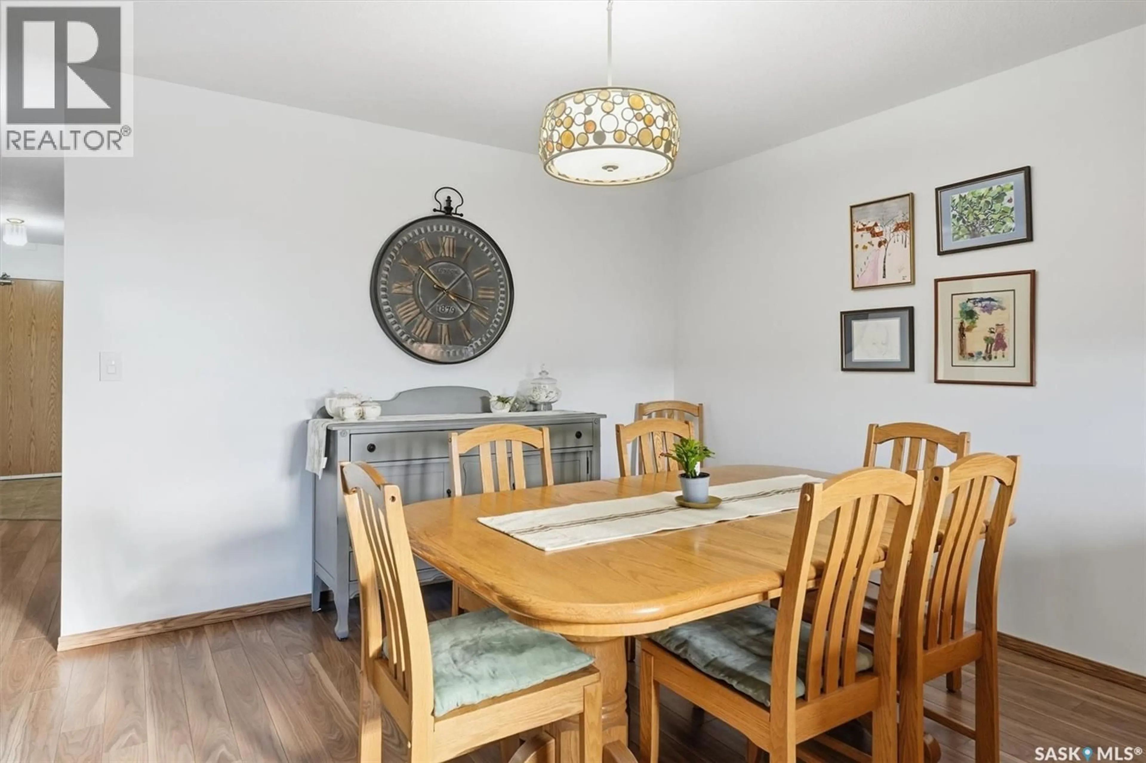Dining room, wood/laminate floor for 201 103 KEEVIL CRESCENT, Saskatoon Saskatchewan S7N4L5