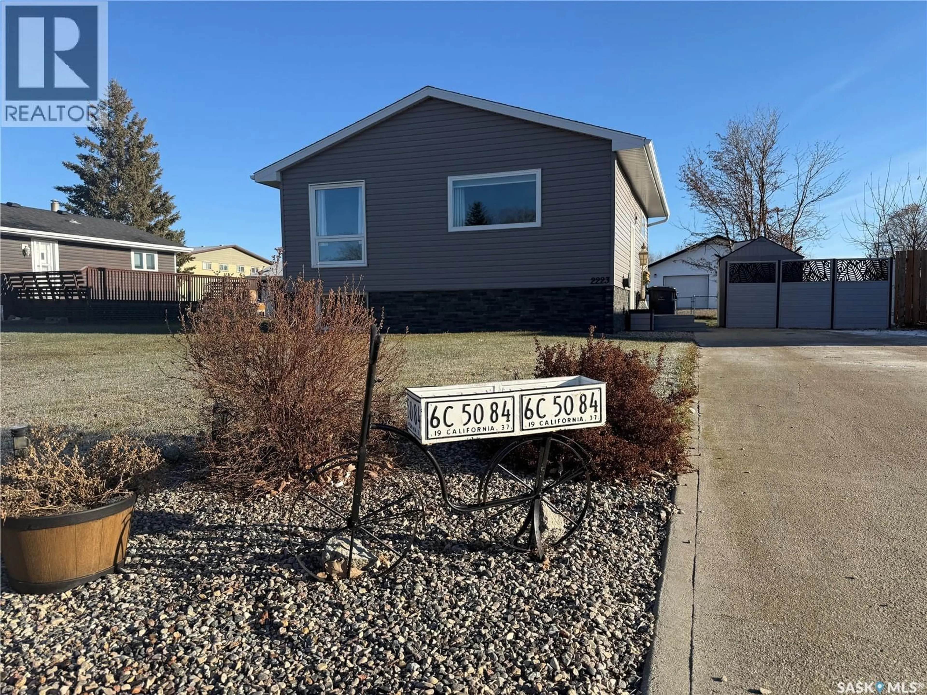 Home with vinyl exterior material, street for 2223 2ND STREET, Carrot River Saskatchewan S0E0L0