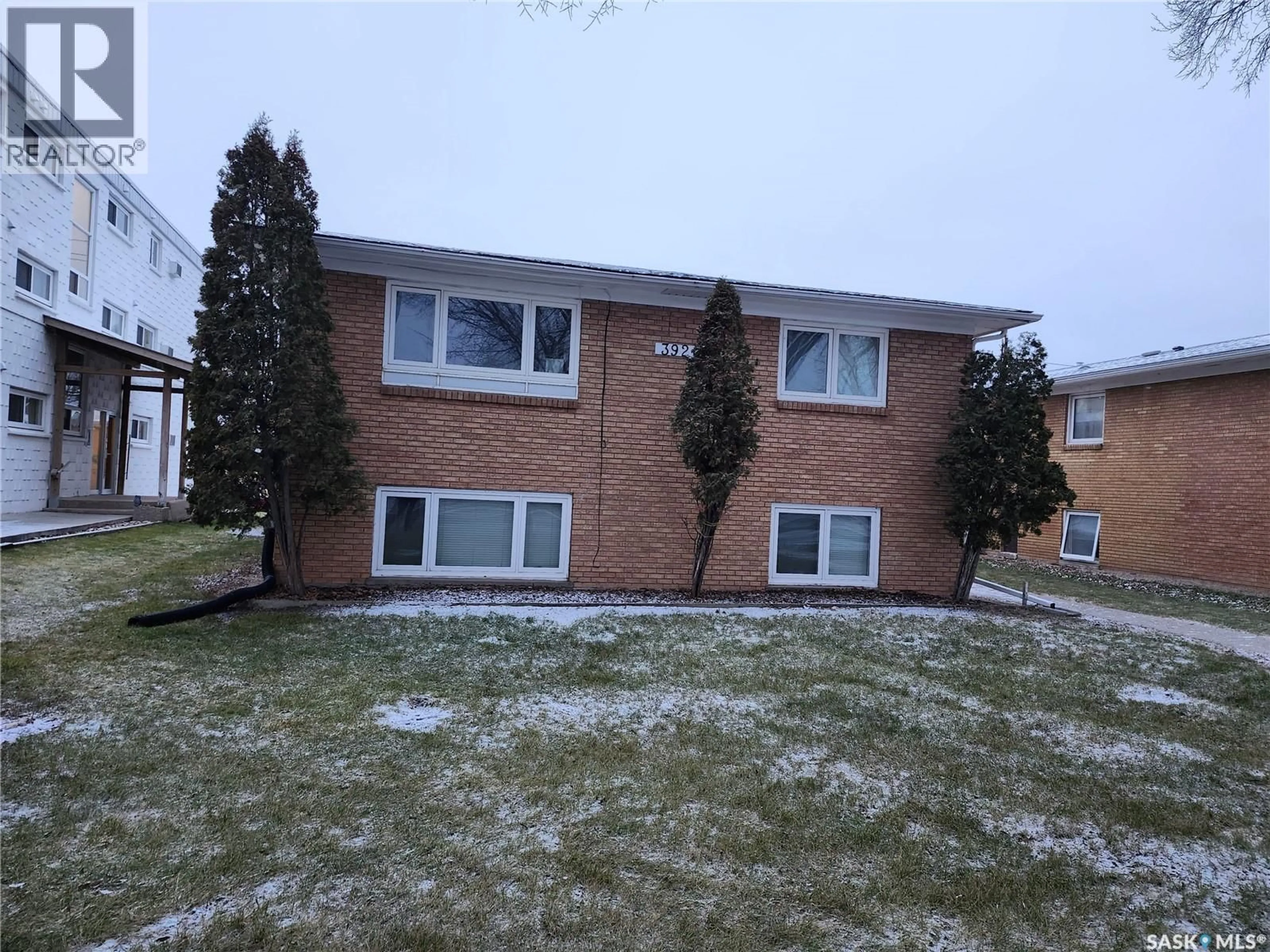 Home with brick exterior material, street for 3920 RETALLACK STREET, Regina Saskatchewan S4S3B9