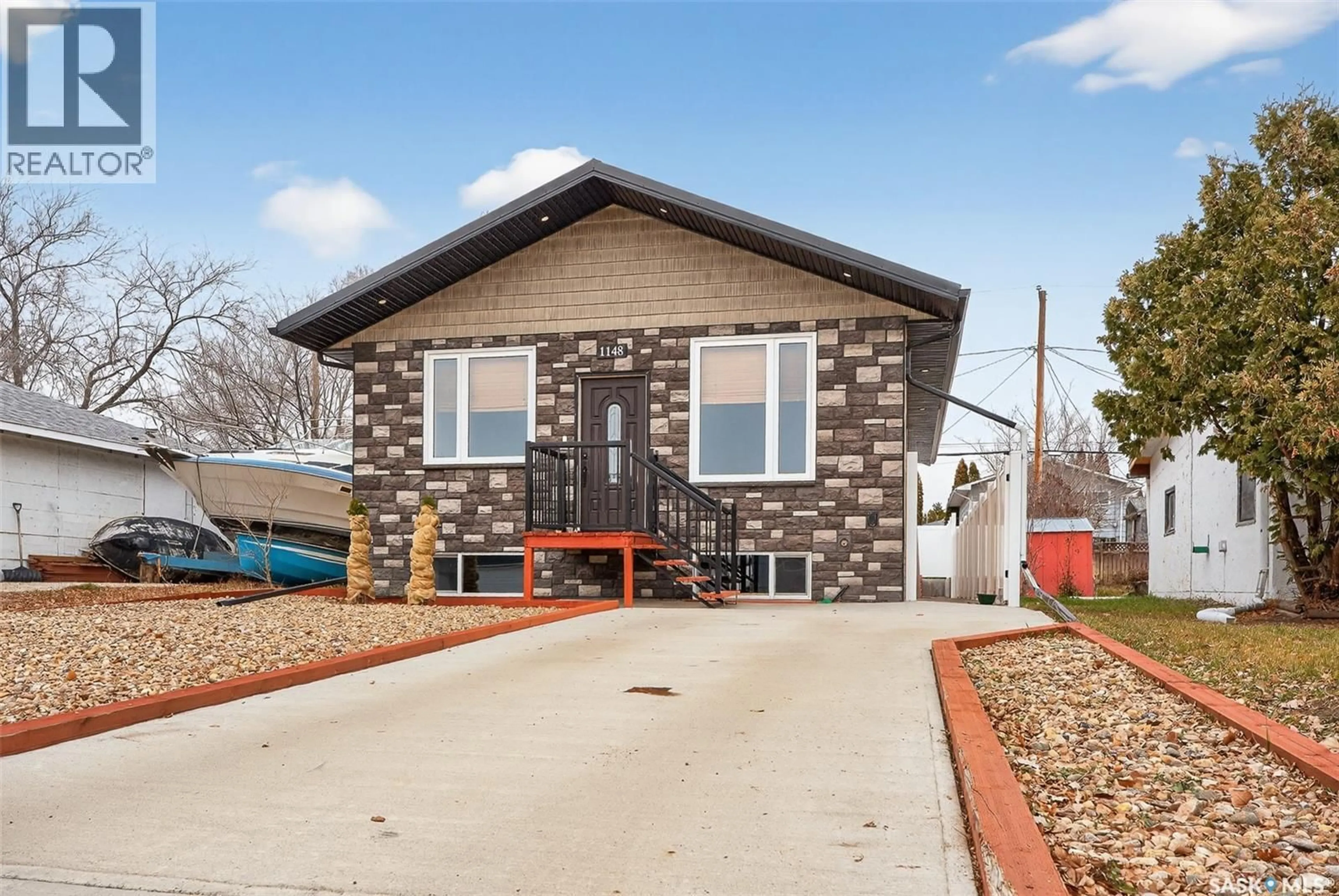 Home with brick exterior material, street for 1148 HOCHELAGA STREET, Moose Jaw Saskatchewan S6J2J2