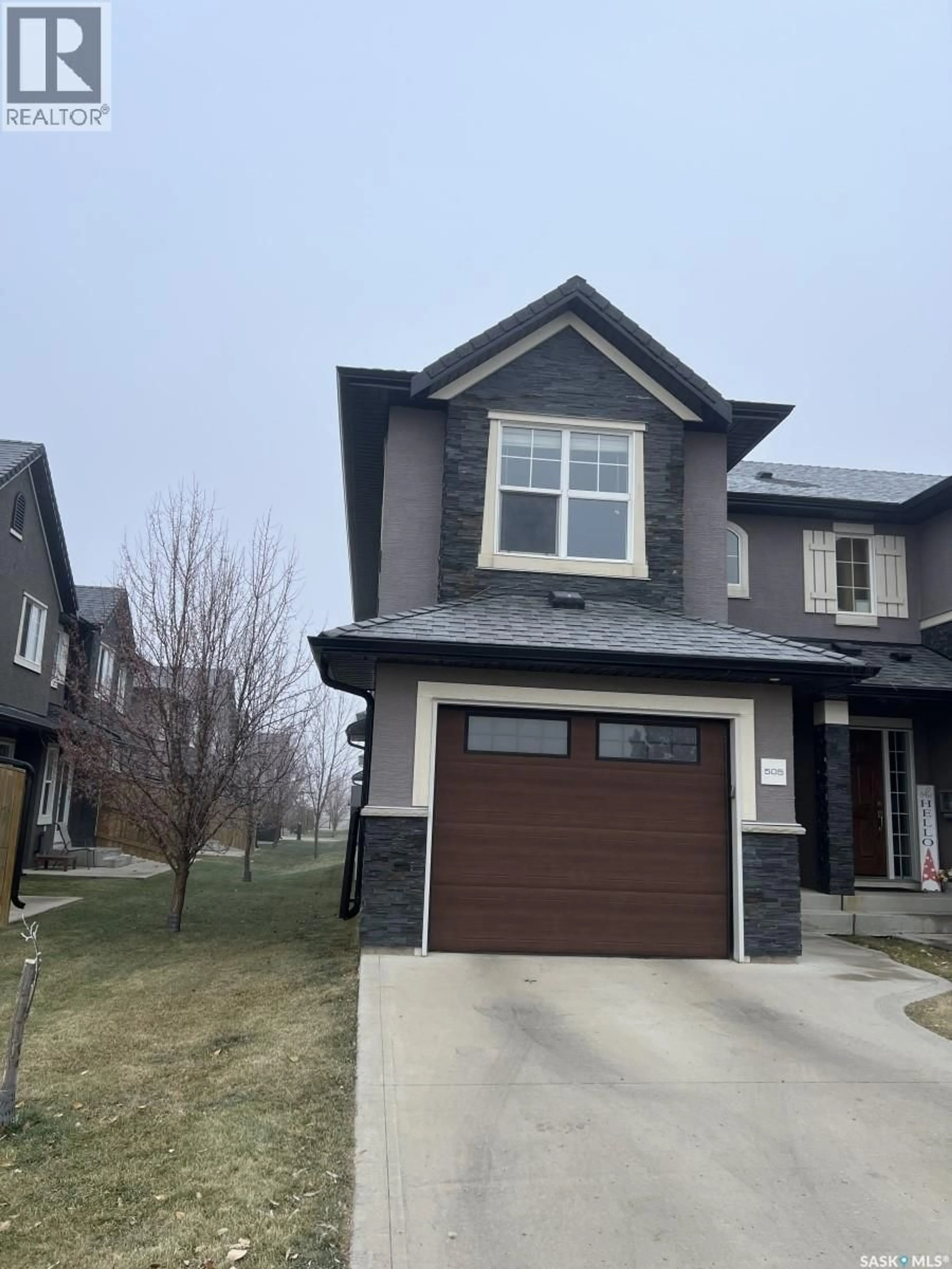 Home with brick exterior material, street for 505 - 1303 PATON CRESCENT, Saskatoon Saskatchewan S7W0P7