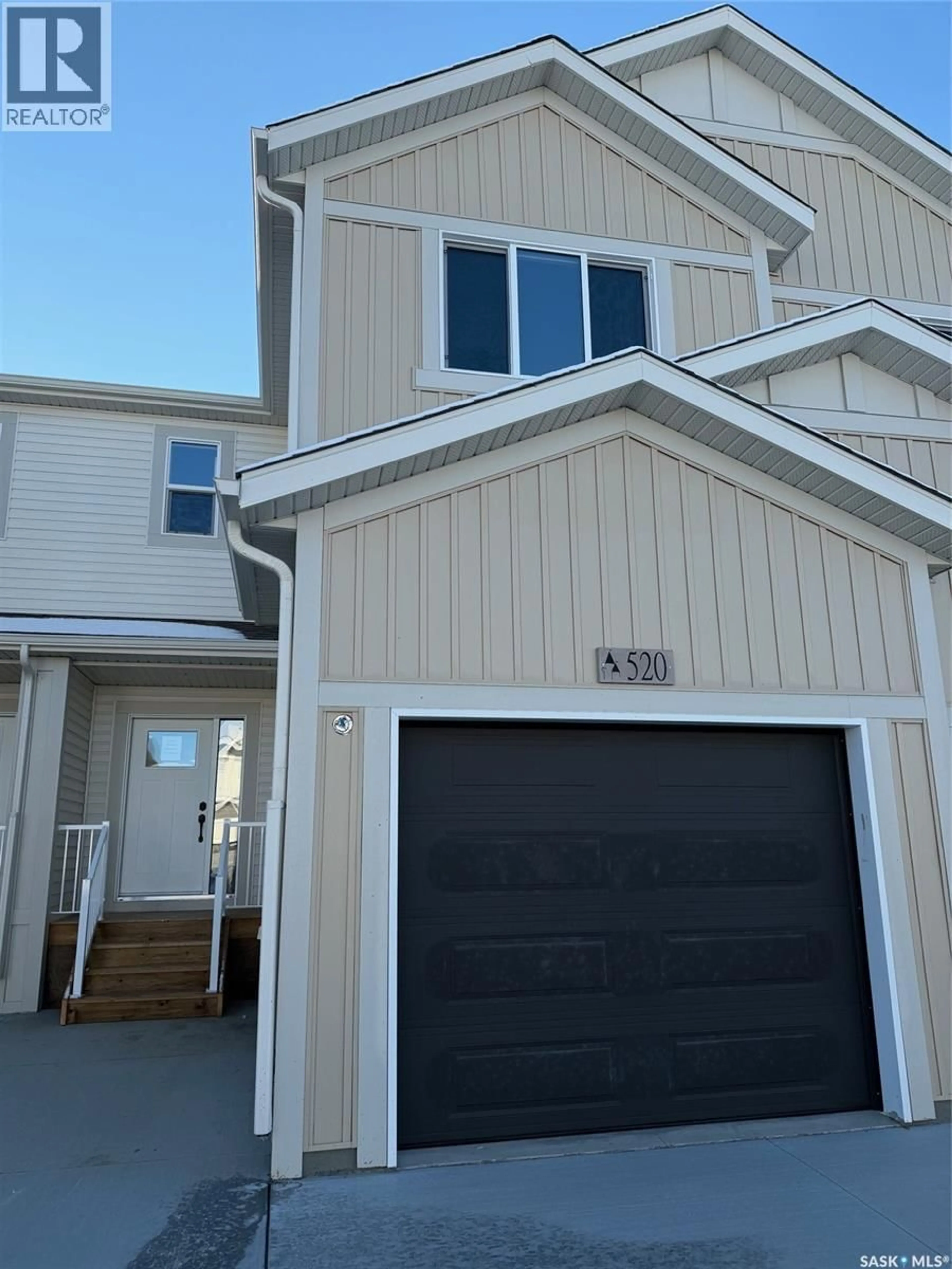 Home with vinyl exterior material, street for 520 MYLES HEIDT MANOR, Saskatoon Saskatchewan S7W0Z4