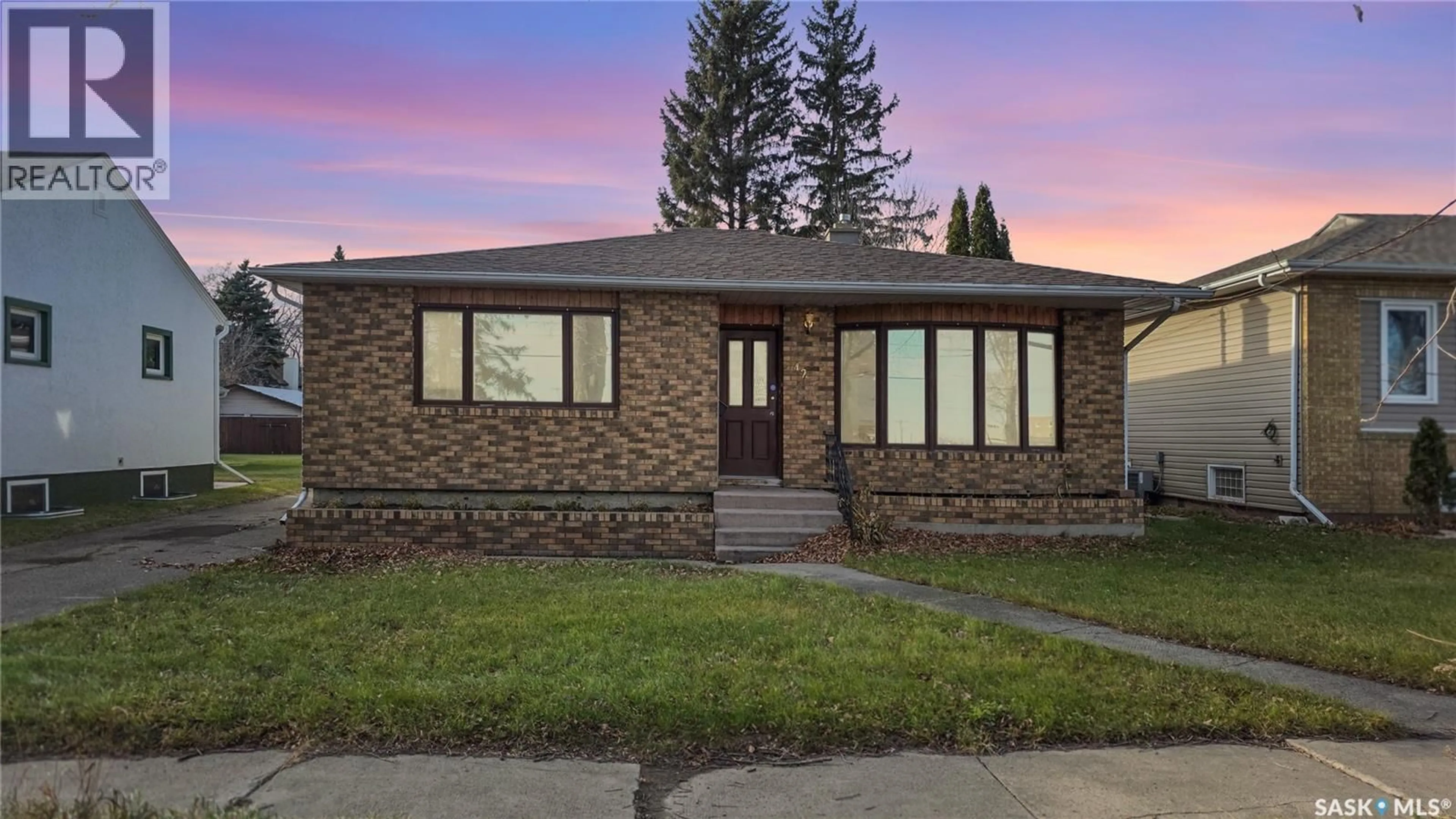 Home with brick exterior material, street for 42 TUPPER AVENUE, Yorkton Saskatchewan S3N1K9