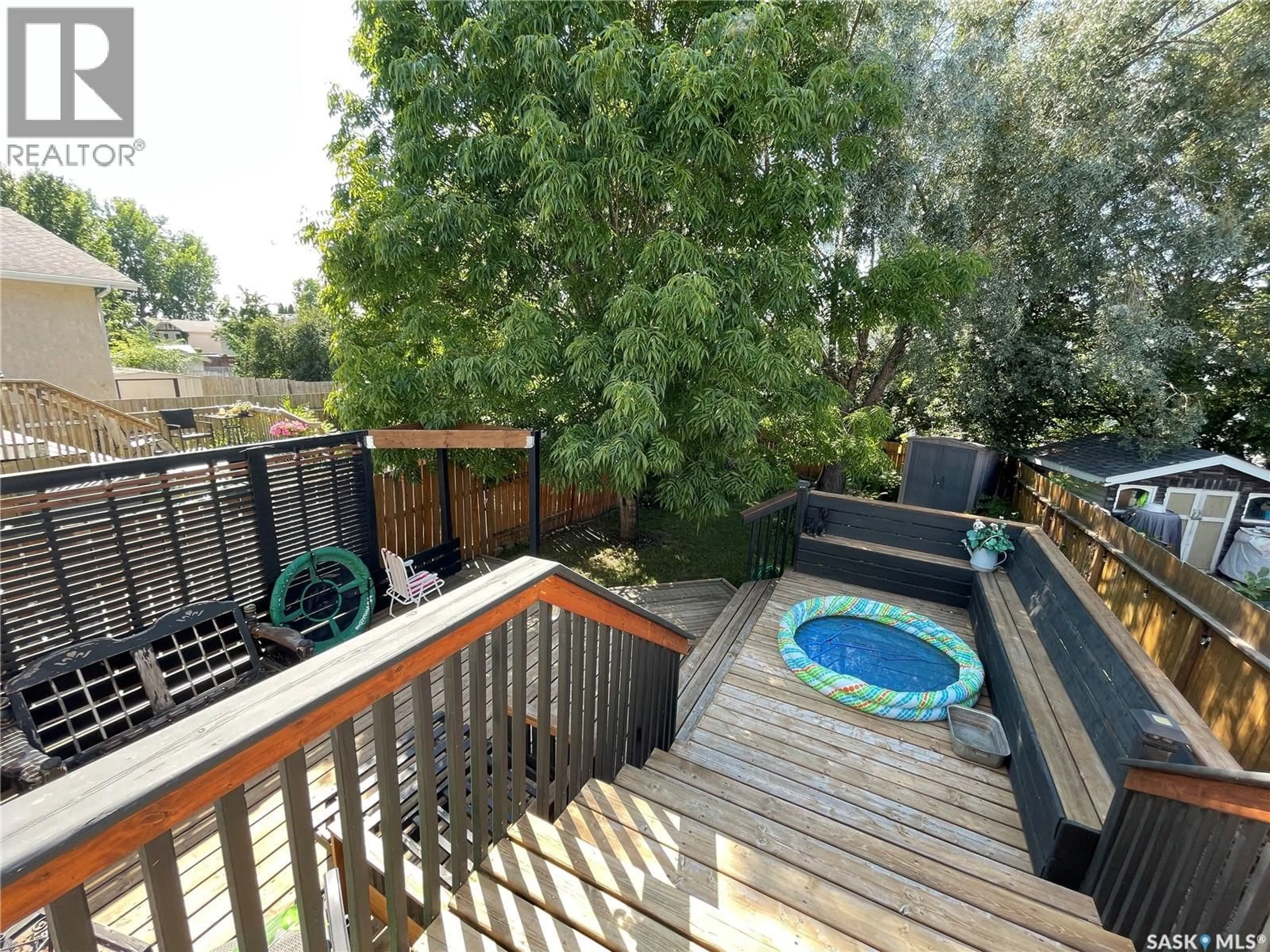 Patio, water/lake/river/ocean view for 228 LOCHRIE CRESCENT, Saskatoon Saskatchewan S7M5E4