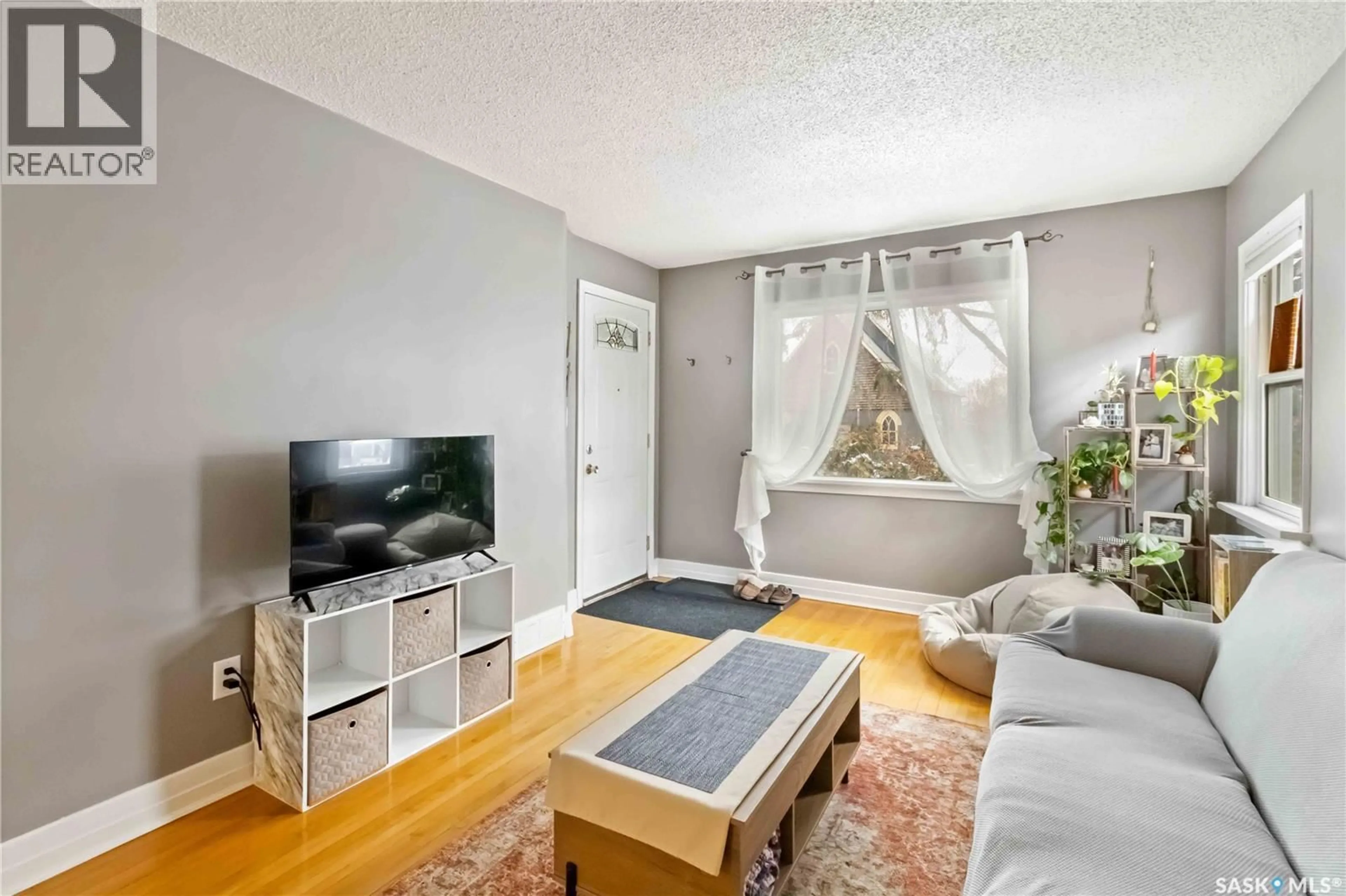 Living room with furniture, unknown for 315 I AVENUE, Saskatoon Saskatchewan S7M1Y1