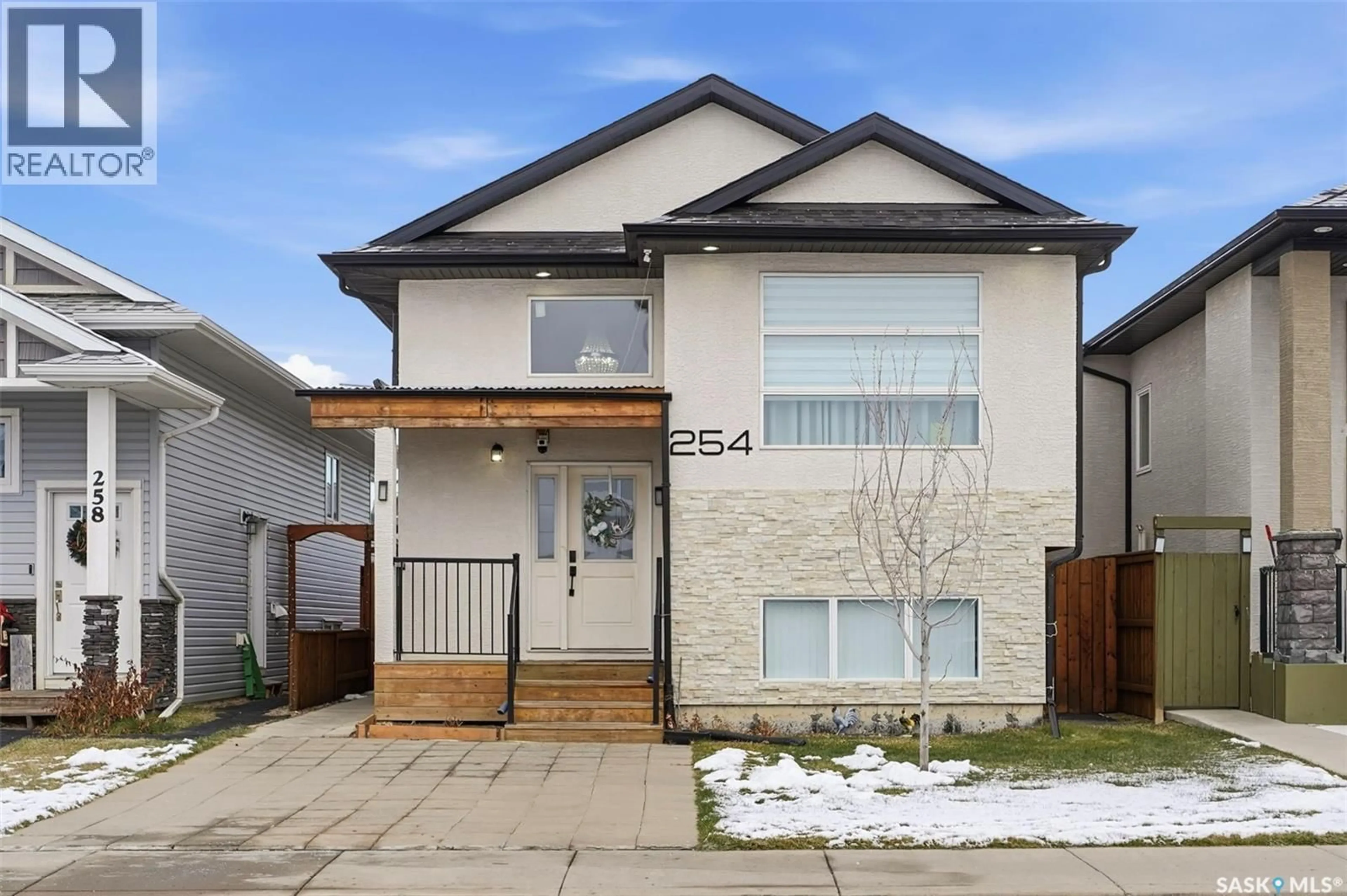Home with brick exterior material, street for 254 ELLS CRESCENT, Saskatoon Saskatchewan S7L6K6