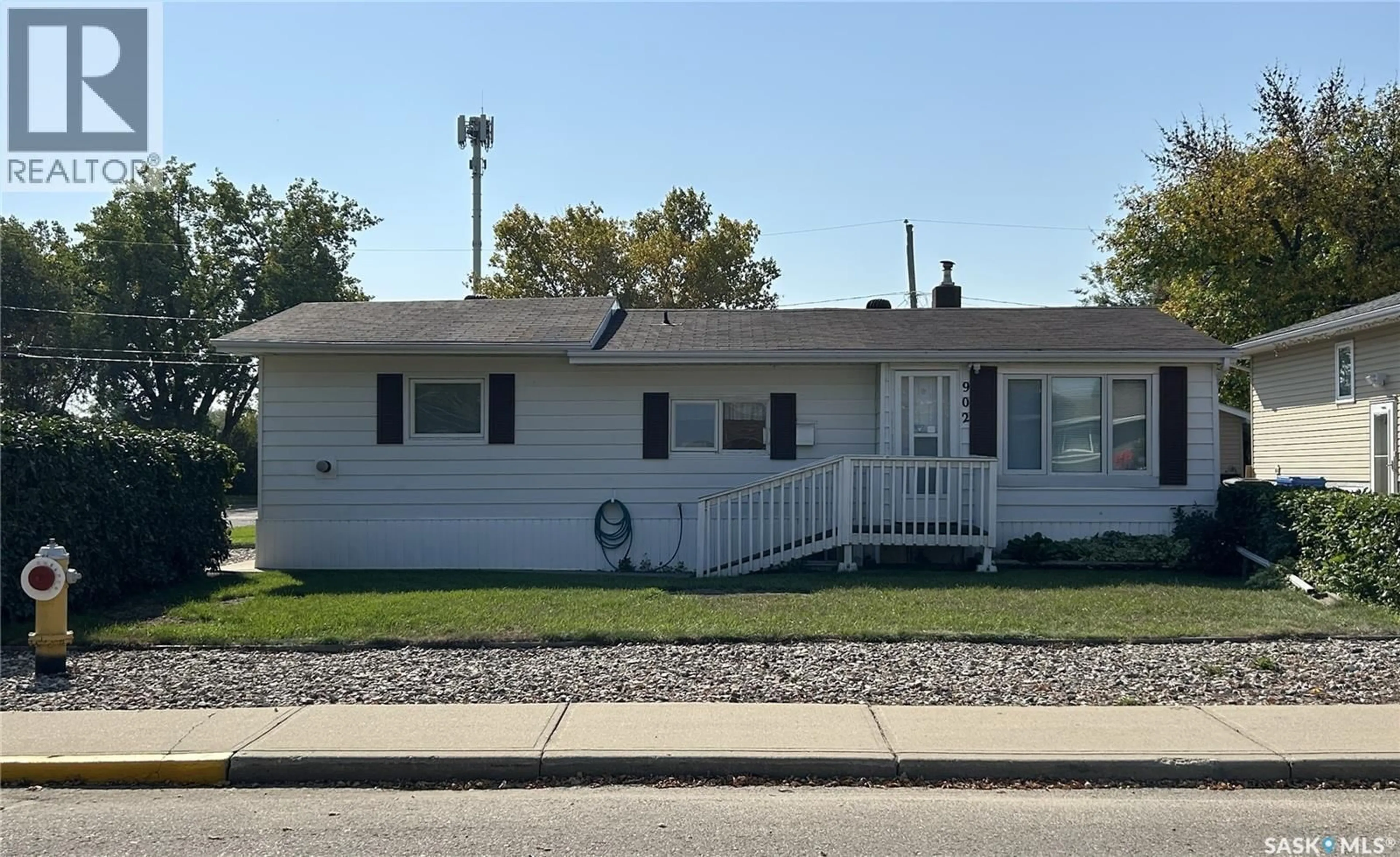 Home with vinyl exterior material, street for 902 EVA STREET, Estevan Saskatchewan S4A1P5