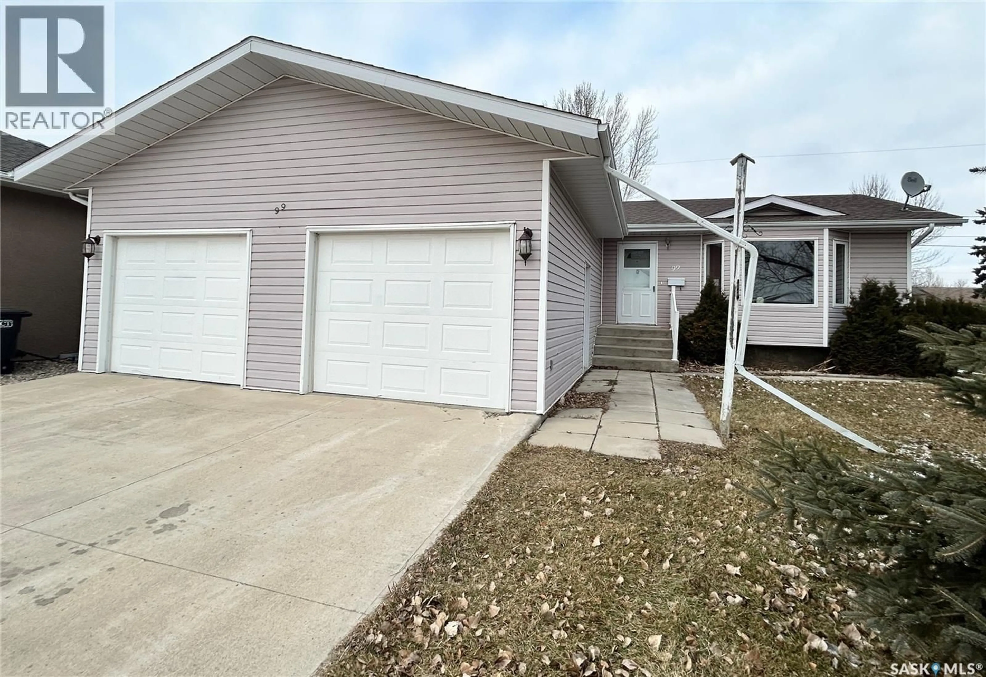 Home with vinyl exterior material, street for 99 LASKIN CRESCENT, Humboldt Saskatchewan S0K2A0