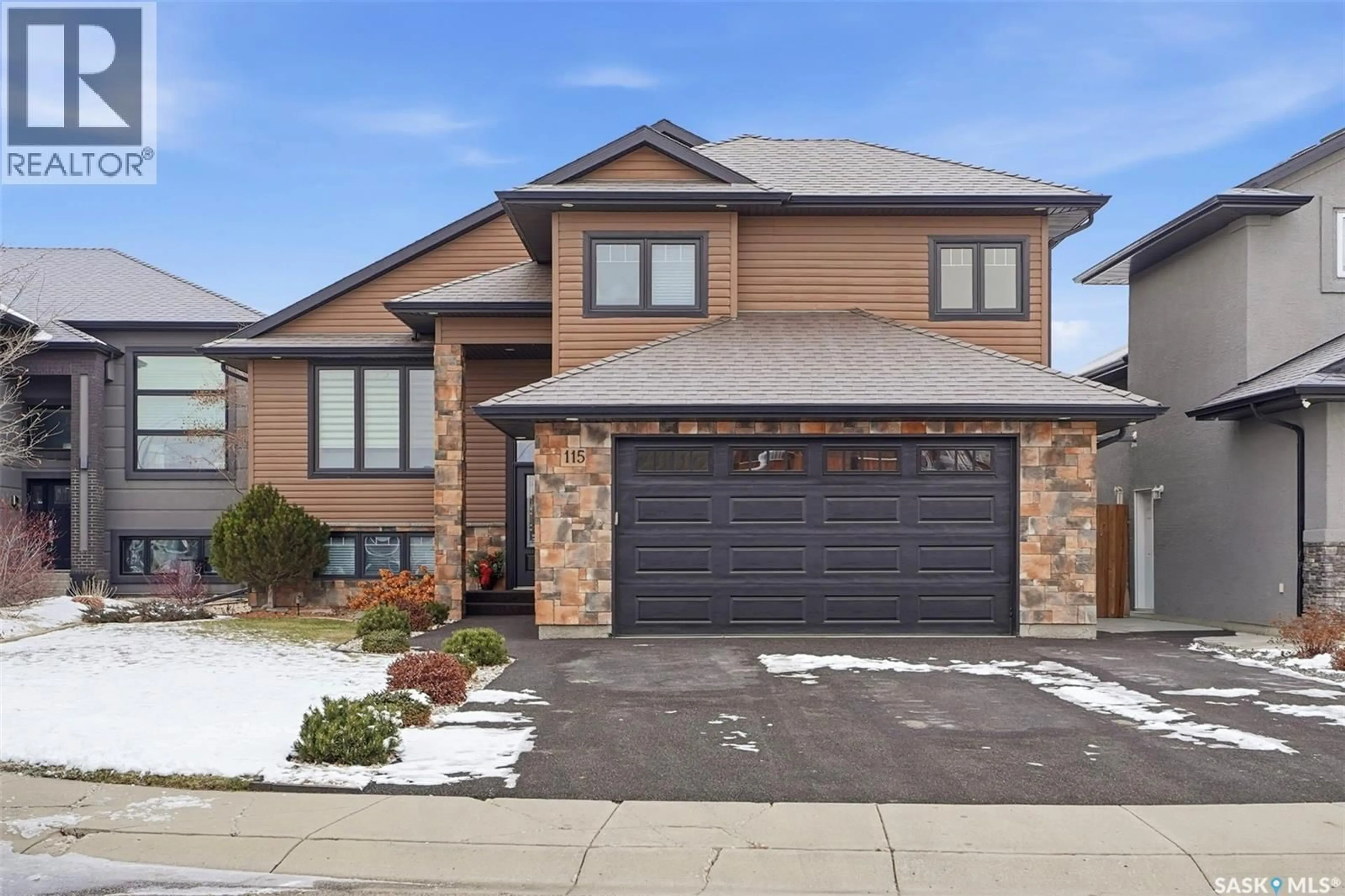 Home with brick exterior material, street for 115 PADGET CRESCENT, Saskatoon Saskatchewan S7W0G9
