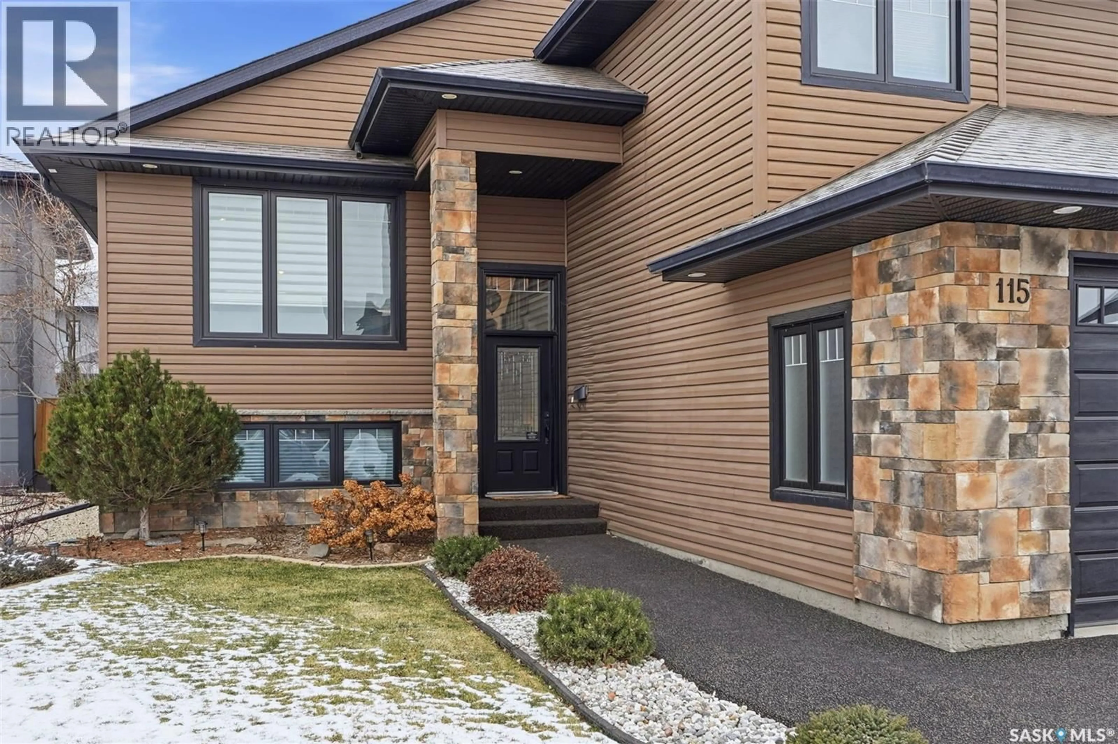 Home with brick exterior material, street for 115 PADGET CRESCENT, Saskatoon Saskatchewan S7W0G9