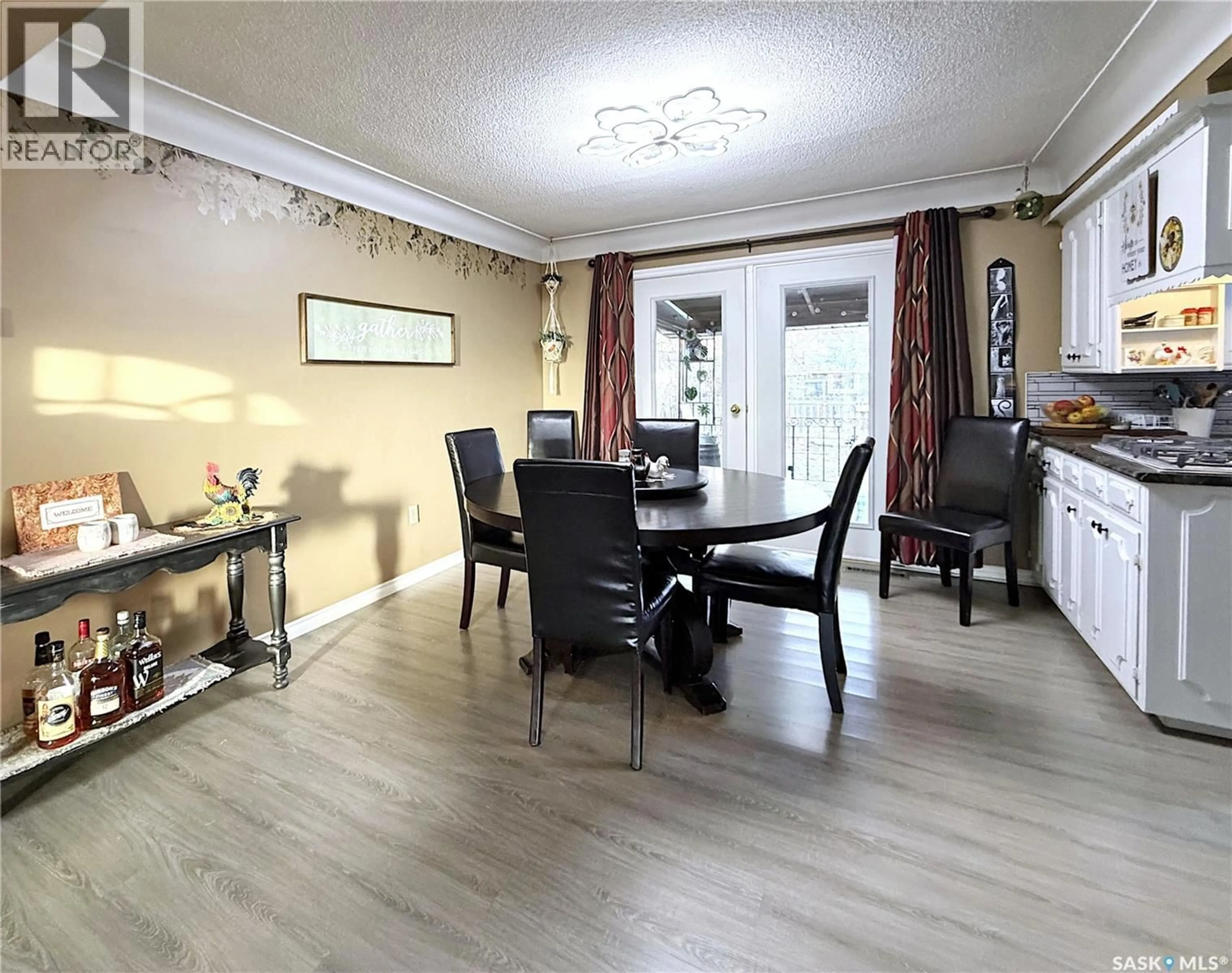 Dining room, wood/laminate floor for 1442 NICHOLSON ROAD, Estevan Saskatchewan S4A1T8