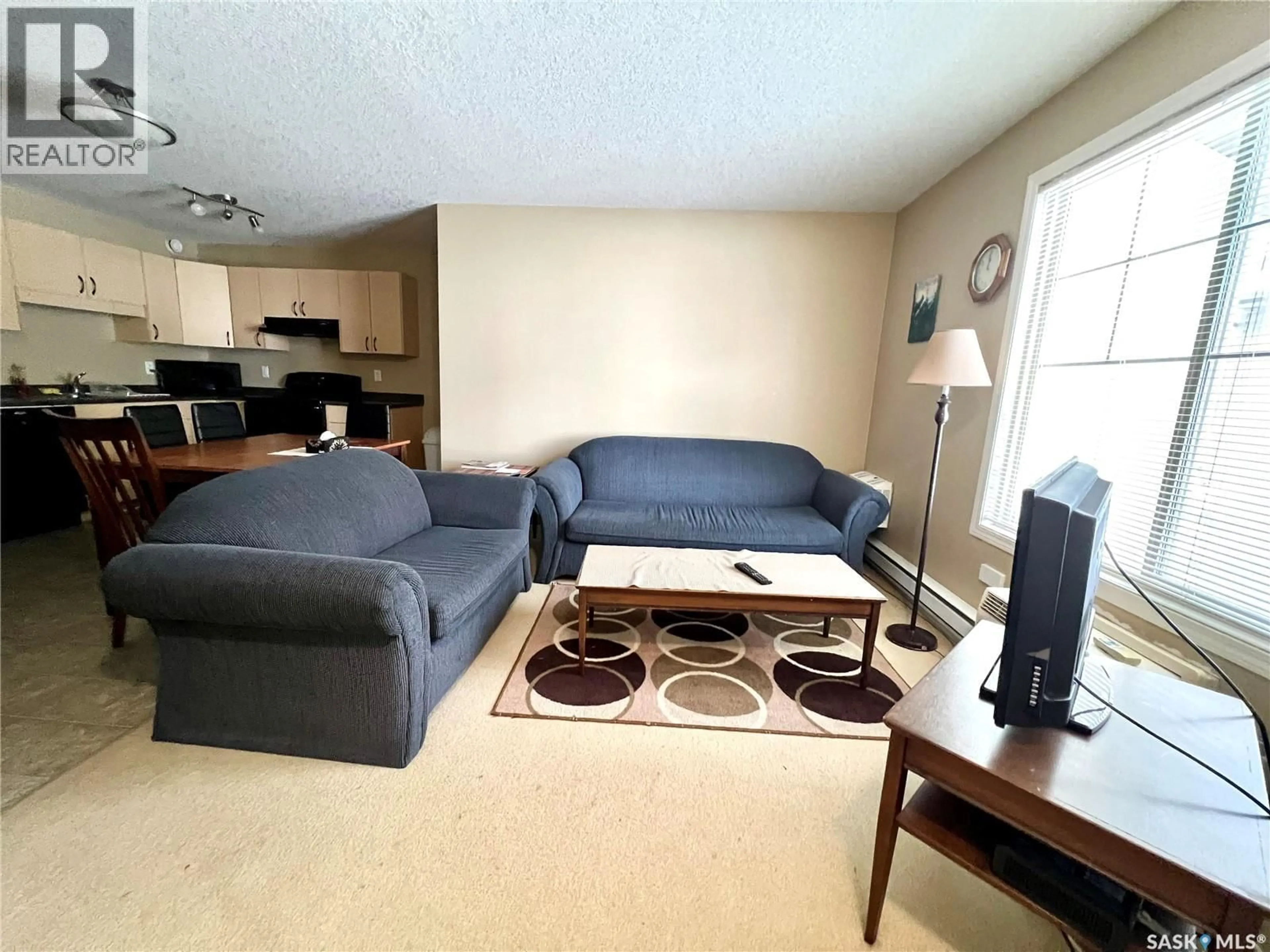 Living room with furniture, unknown for 700 - 304 BATTLEFORD TRAIL, Swift Current Saskatchewan S9H4V9