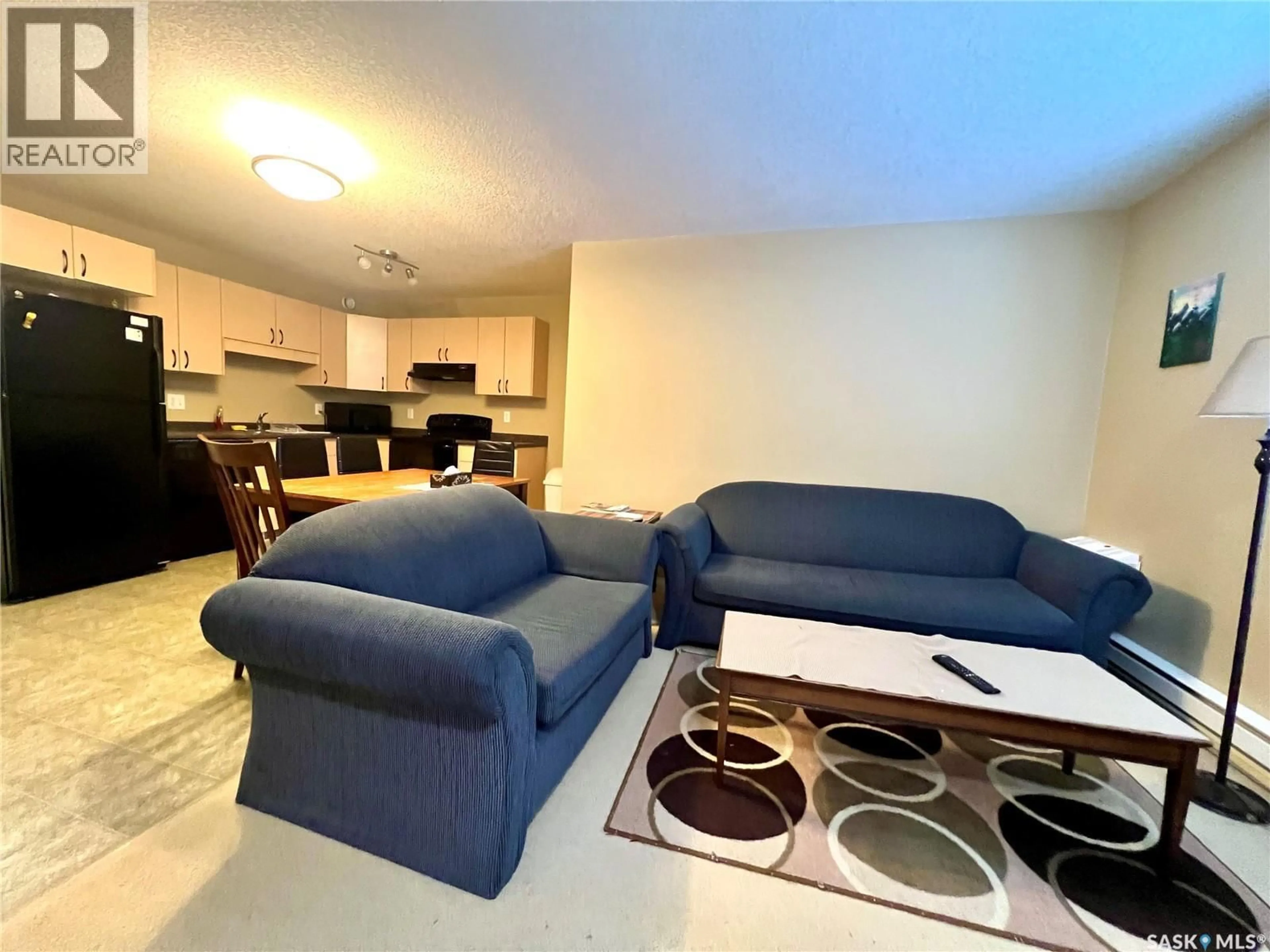 Living room with furniture, unknown for 700 - 304 BATTLEFORD TRAIL, Swift Current Saskatchewan S9H4V9
