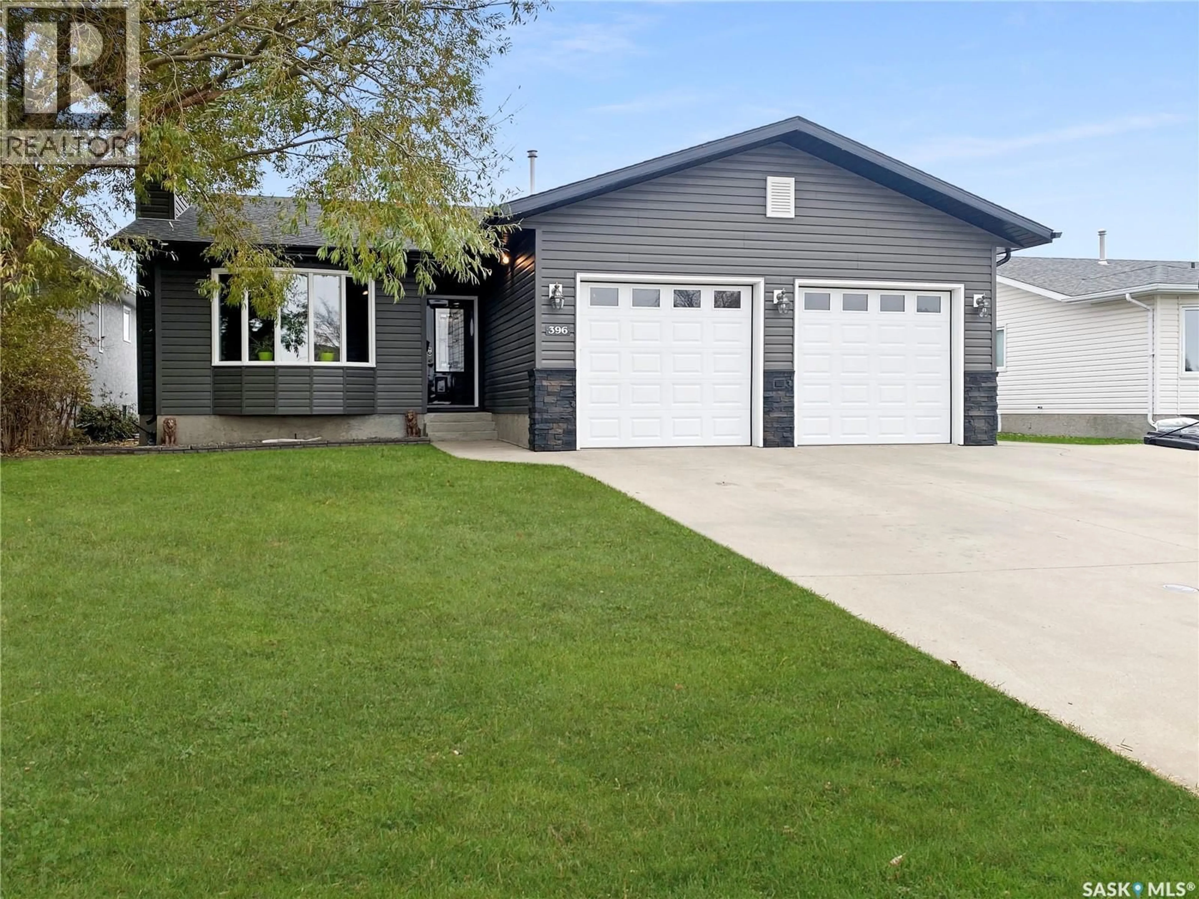 Home with vinyl exterior material, street for 396 PETTERSON DRIVE, Estevan Saskatchewan S4A2P4
