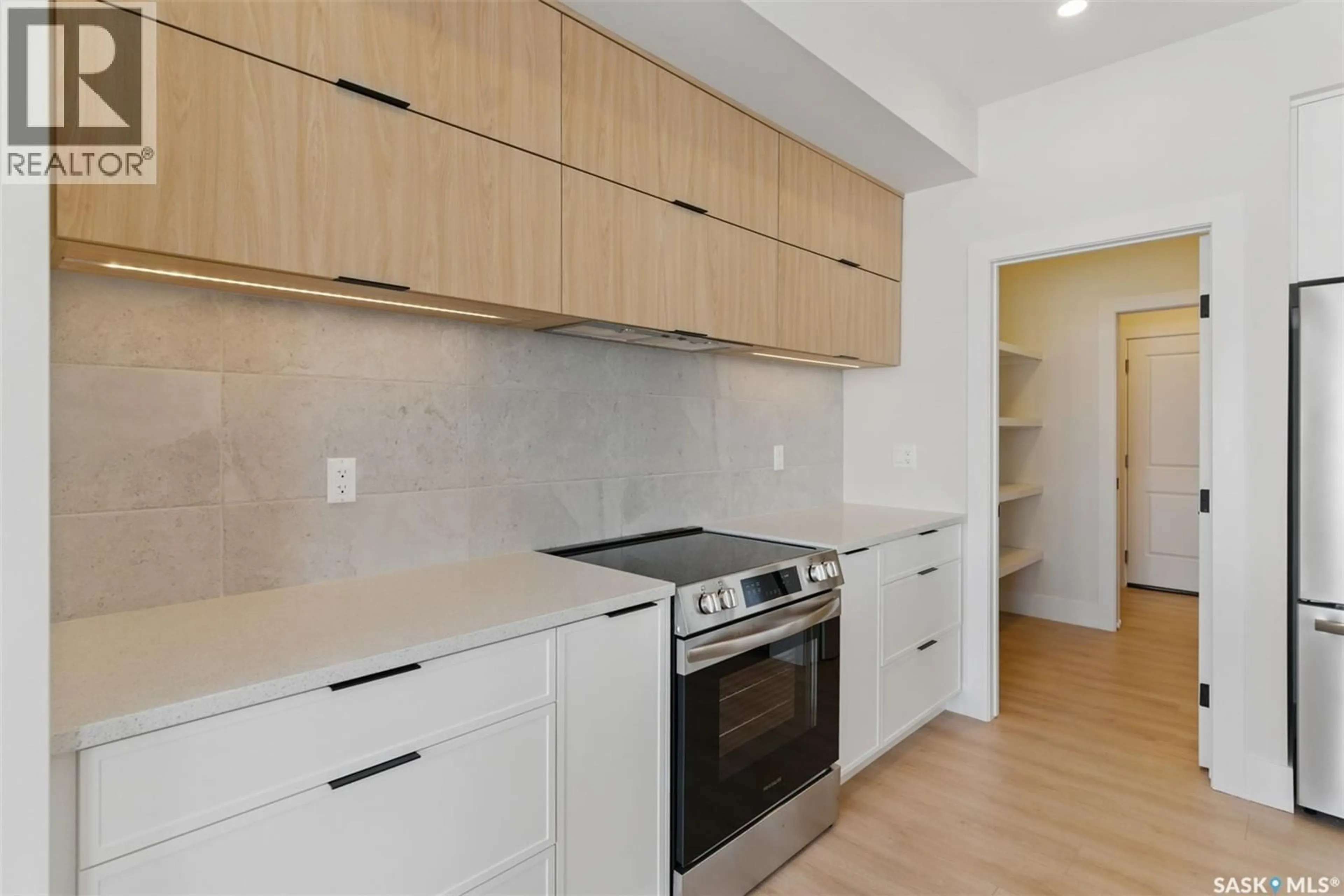 Standard kitchen, wood/laminate floor for 218 VETERANS DRIVE, Warman Saskatchewan S0K0A1