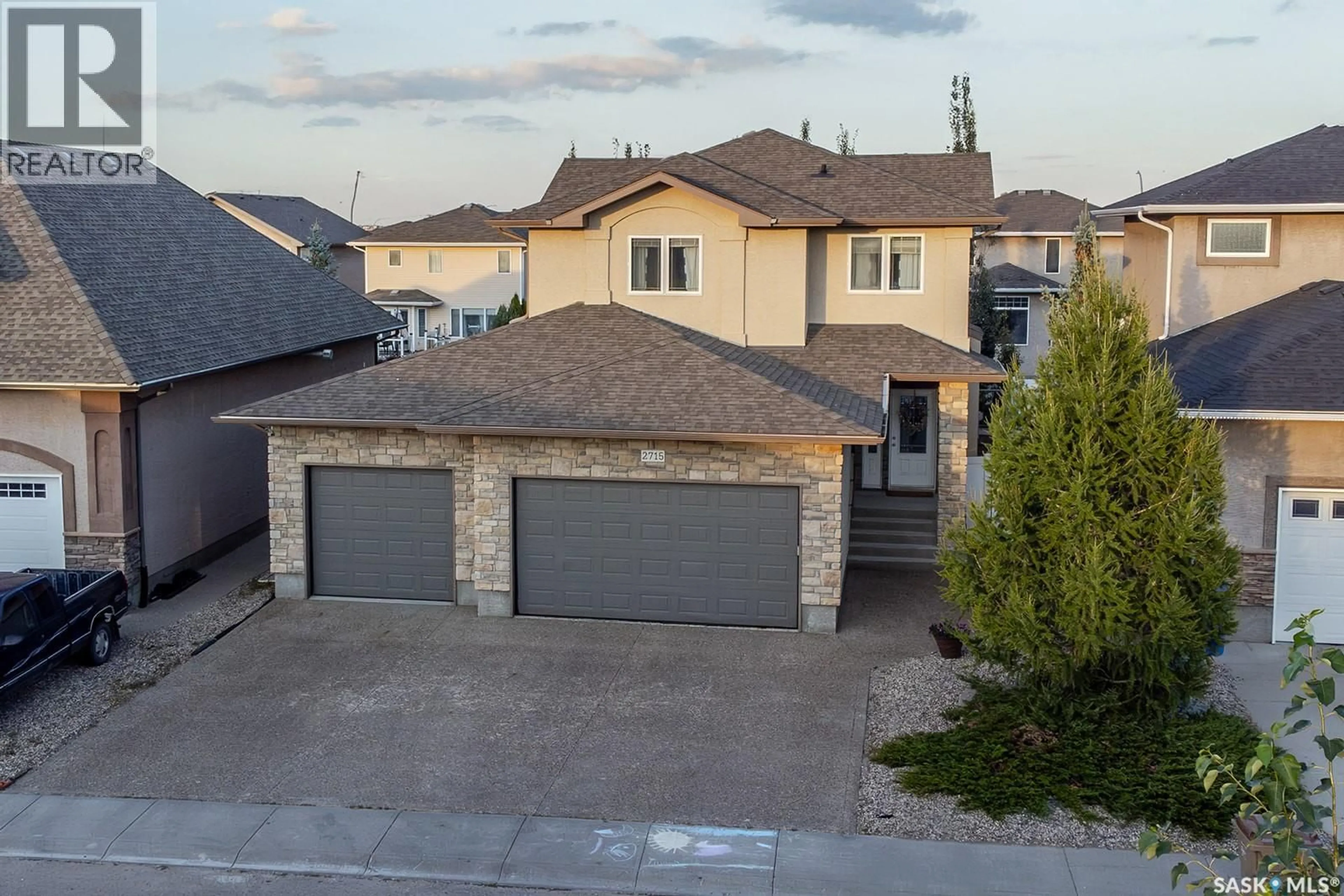 A pic from outside/outdoor area/front of a property/back of a property/a pic from drone, street for 2715 HIGHGROVE ROAD, Regina Saskatchewan S4V0N3